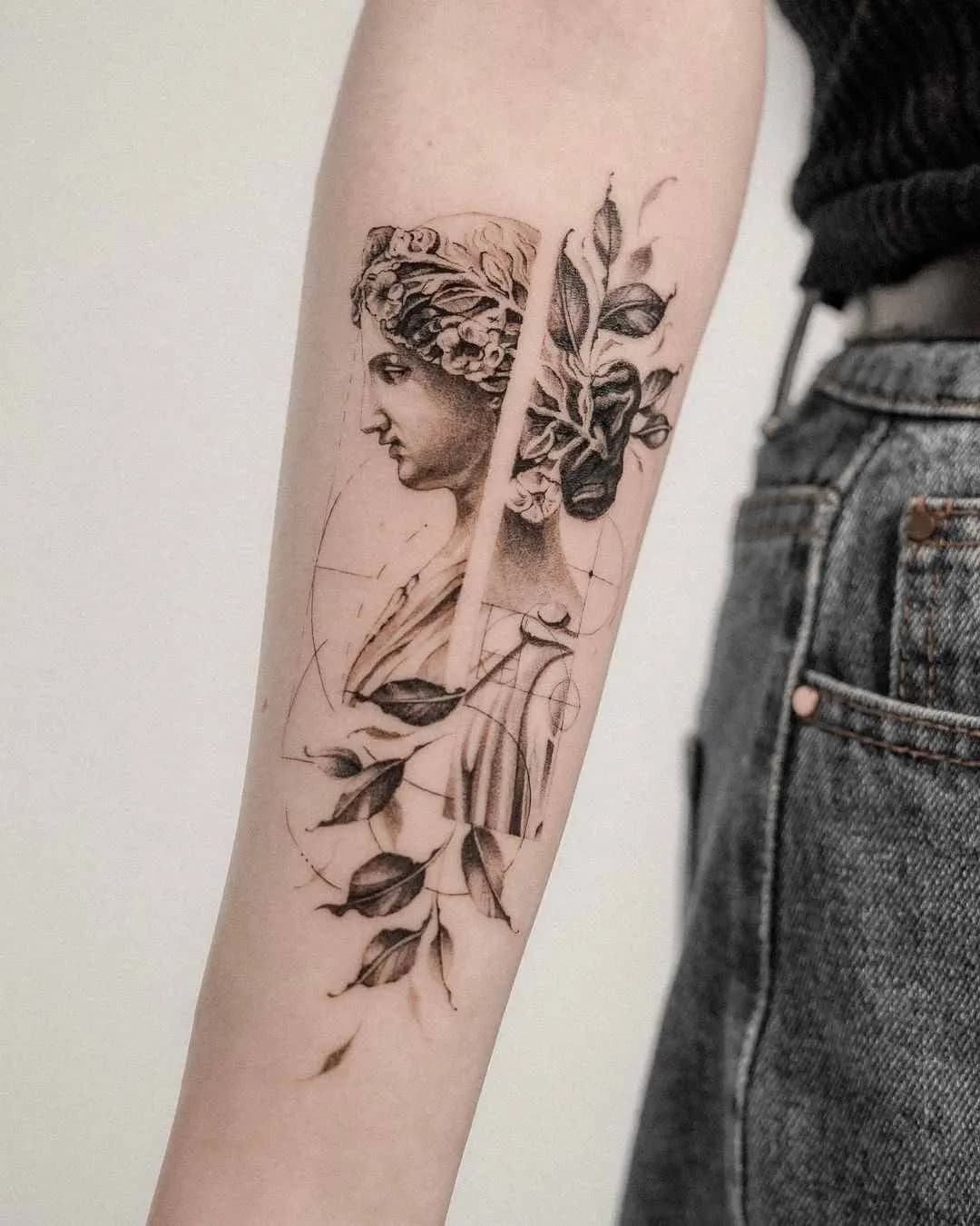 Black and grey forearm tattoo of a classical female bust with leaves and geometric lines.