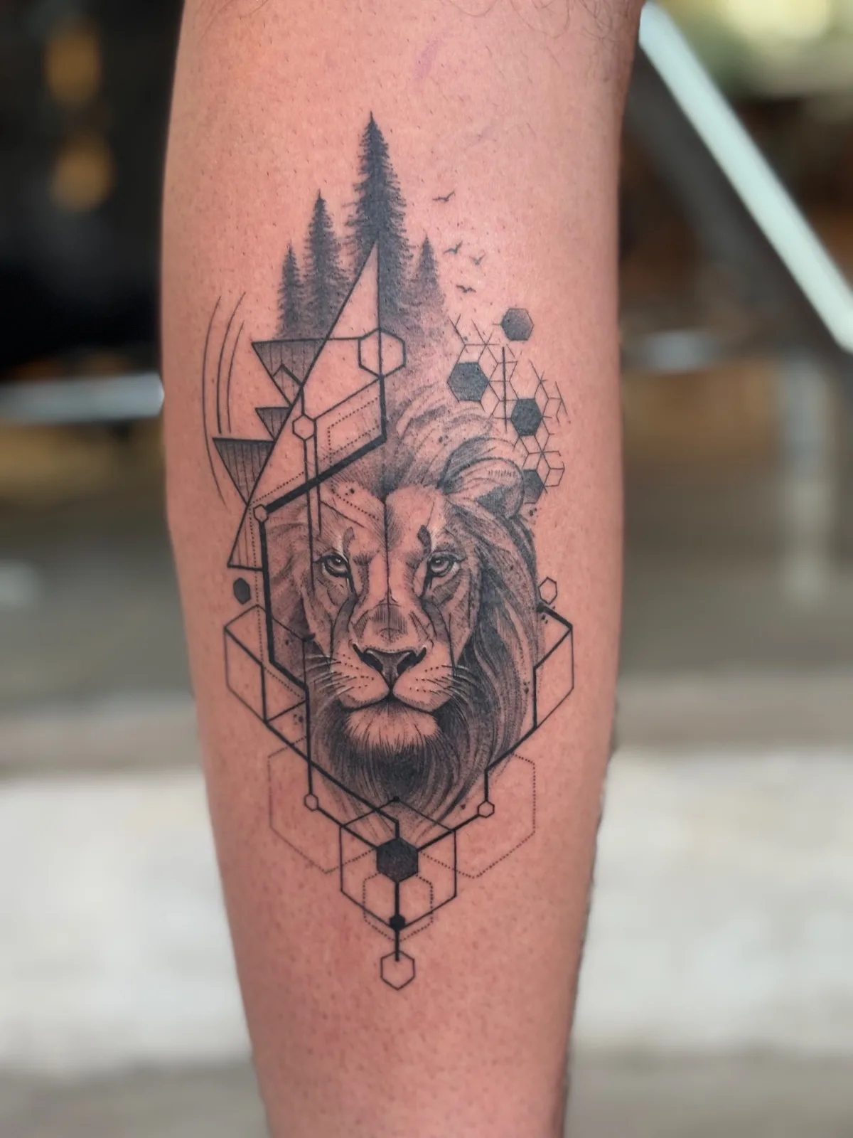 Fine line abstract tattoo on the arm