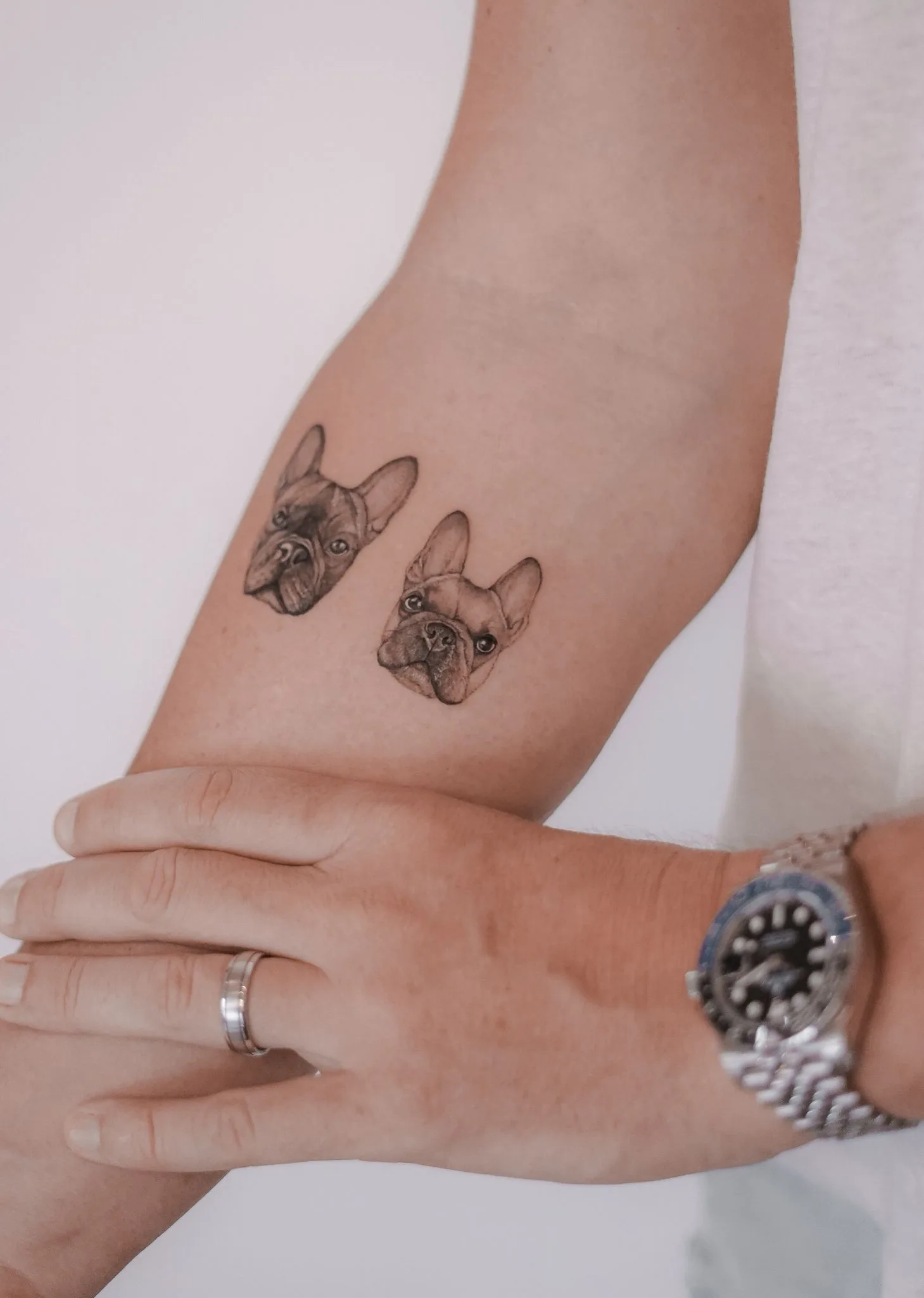Fine line animal tattoo on the arm