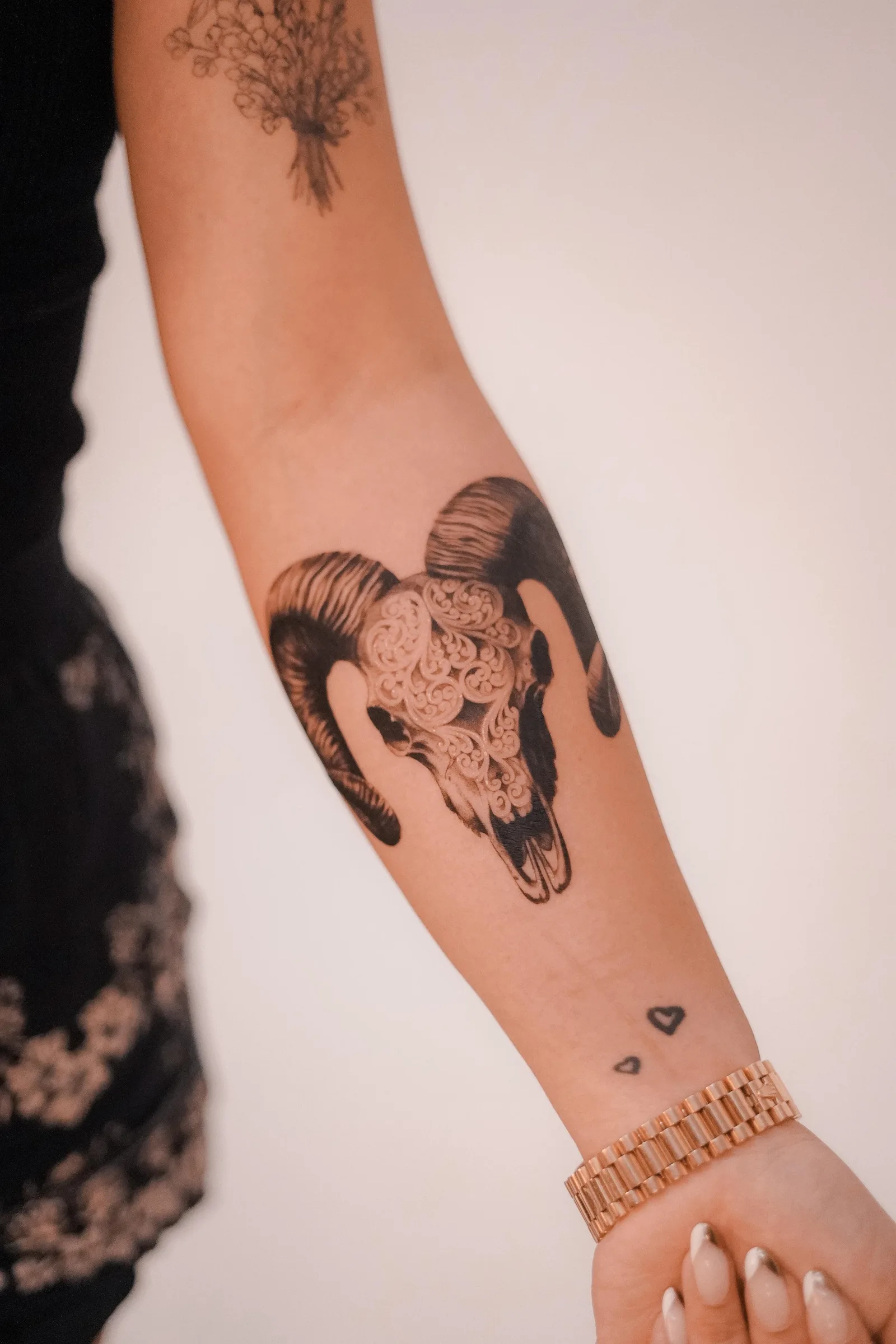 Fine line animal tattoo on the arm