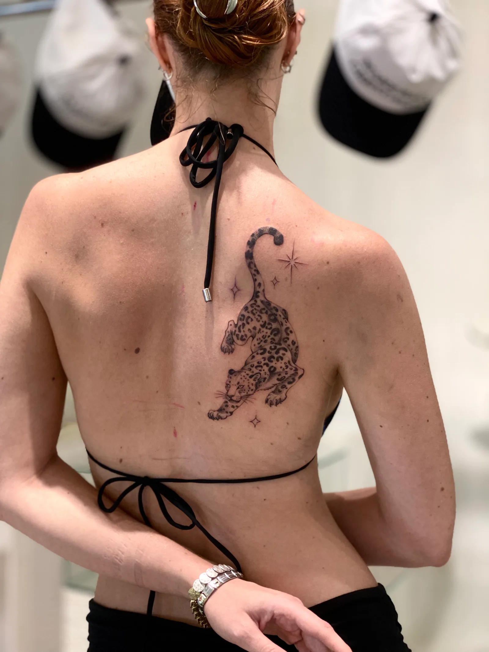 Fine line animal tattoo on the arm