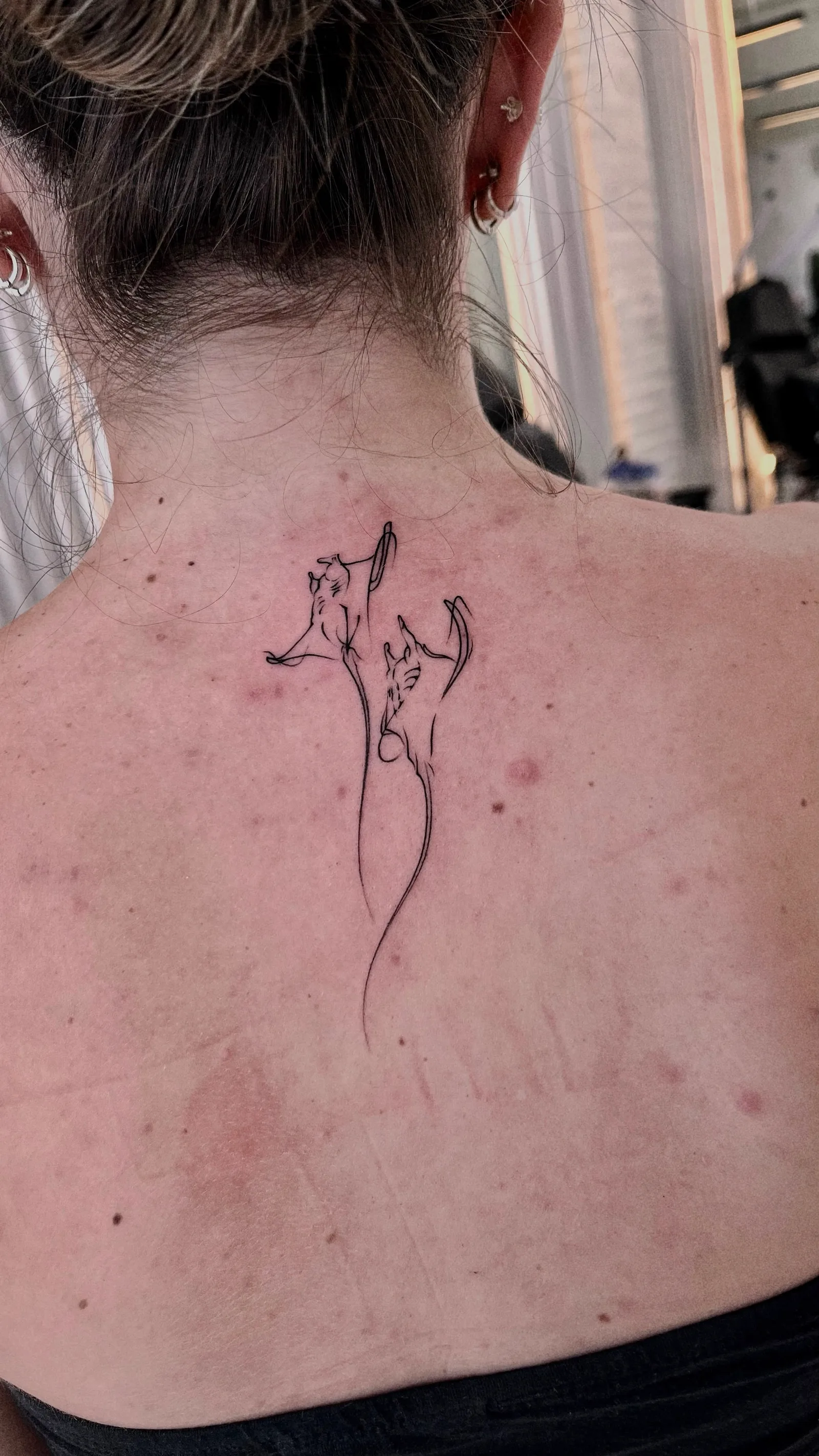 Fine line Balinese tattoo on the arm