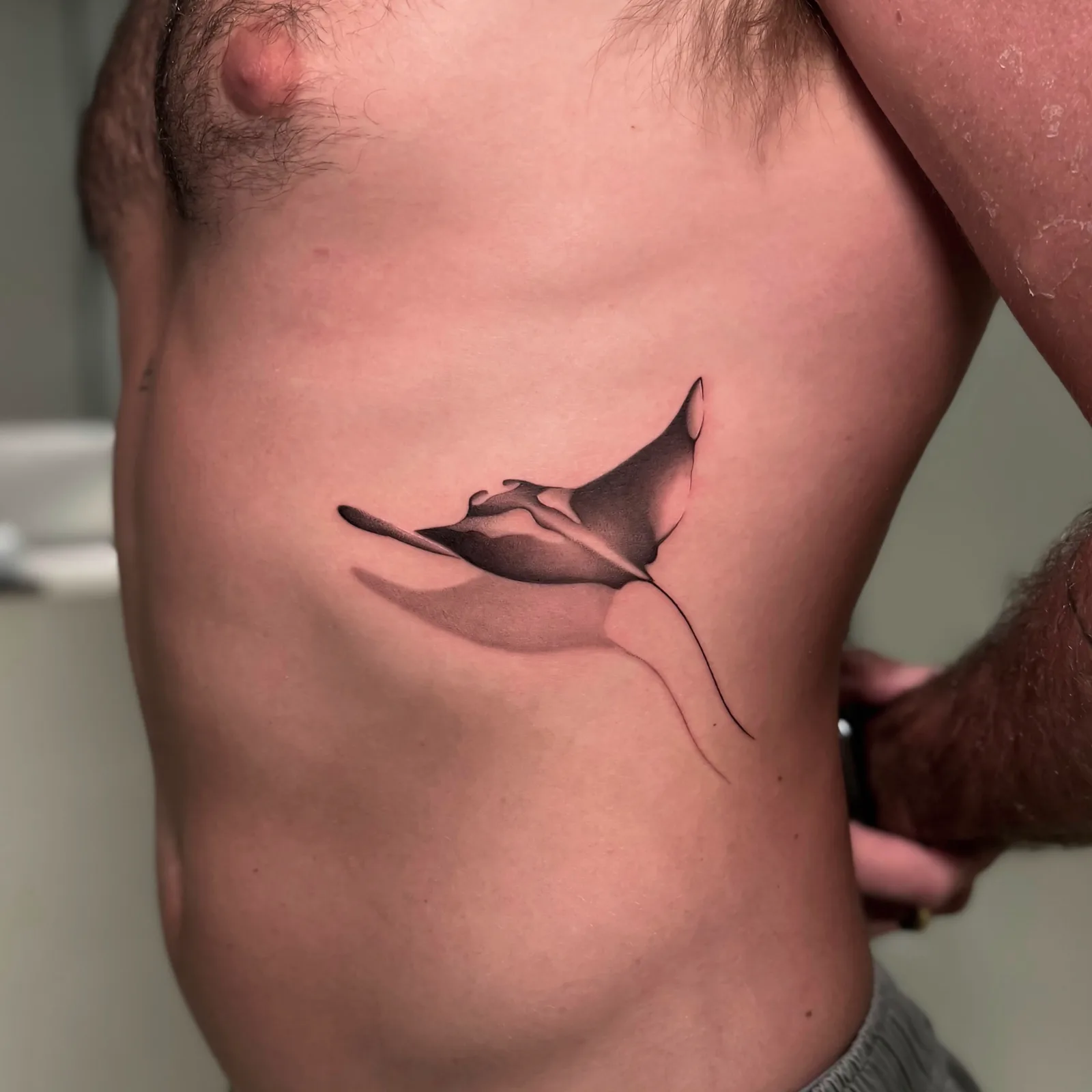 Fine line Balinese tattoo on the arm