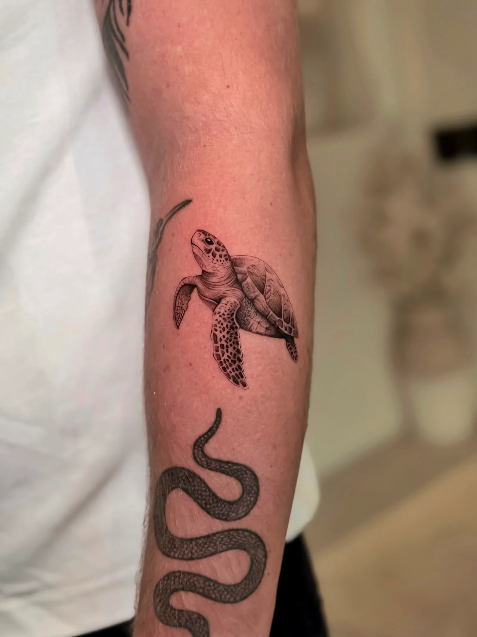 Realism Balinese tattoo on the arm