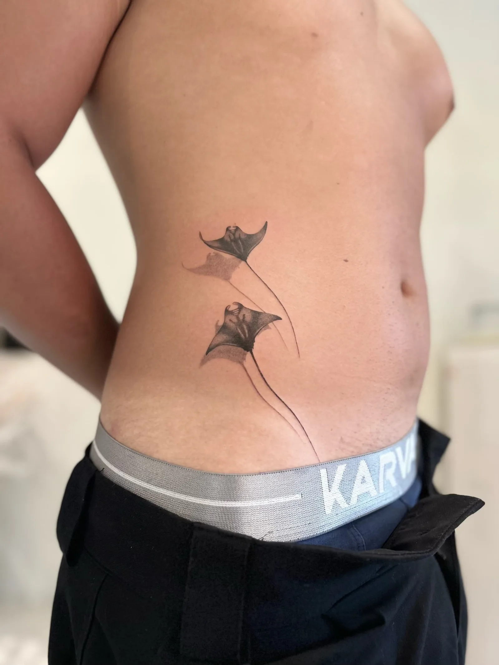 Fine line Balinese tattoo on the arm