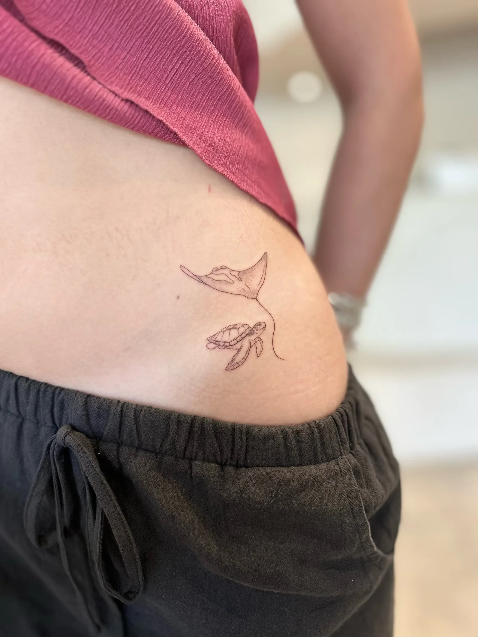 Fine line Balinese tattoo on the arm