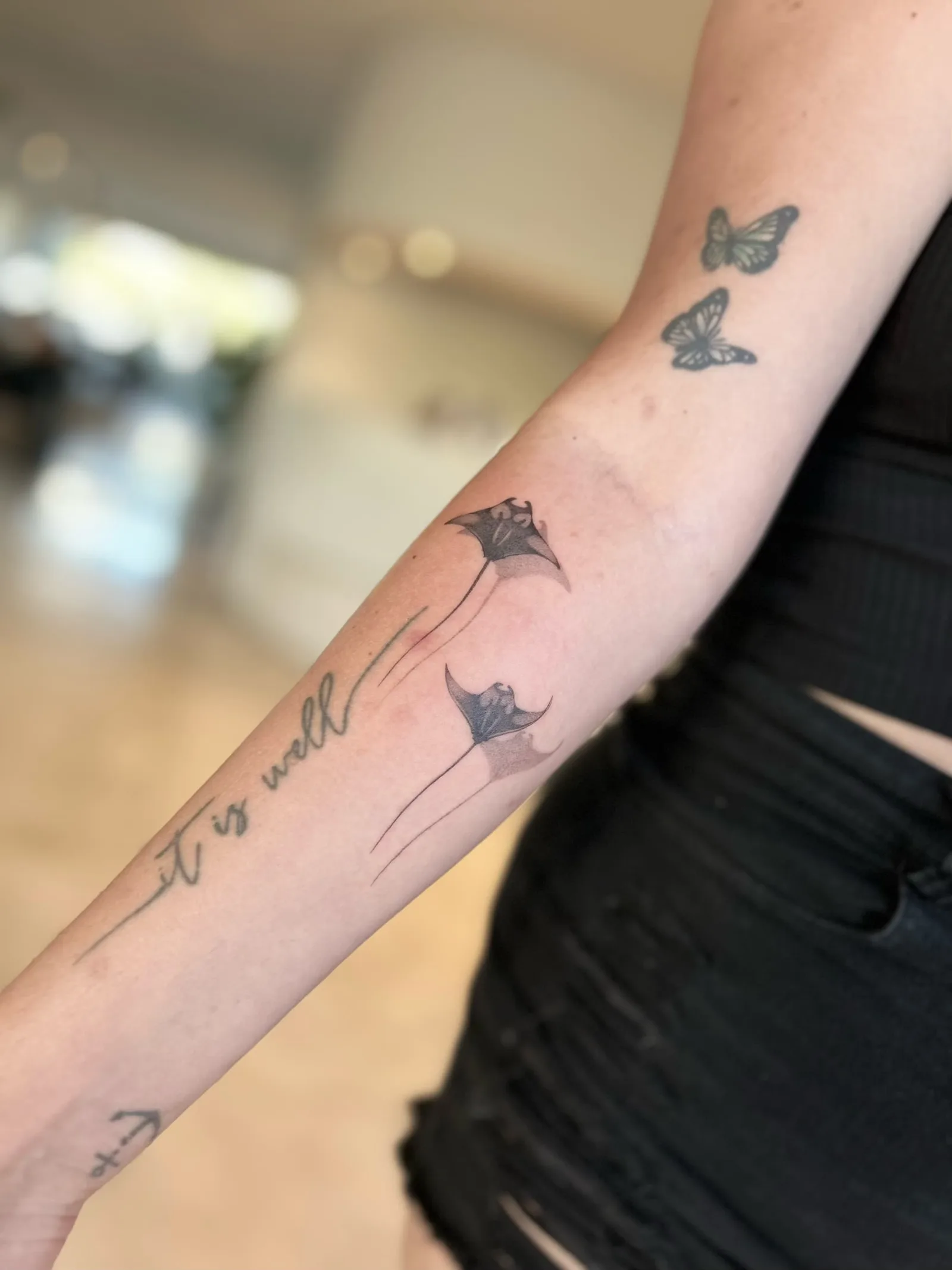 Fine line Balinese tattoo on the arm