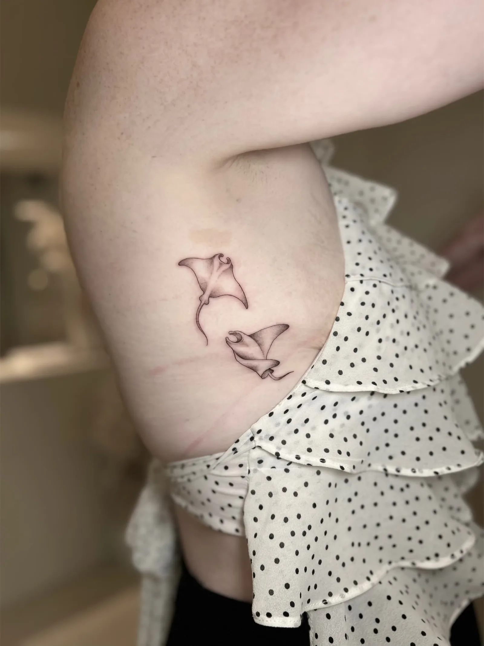 Fine line Balinese tattoo on the arm