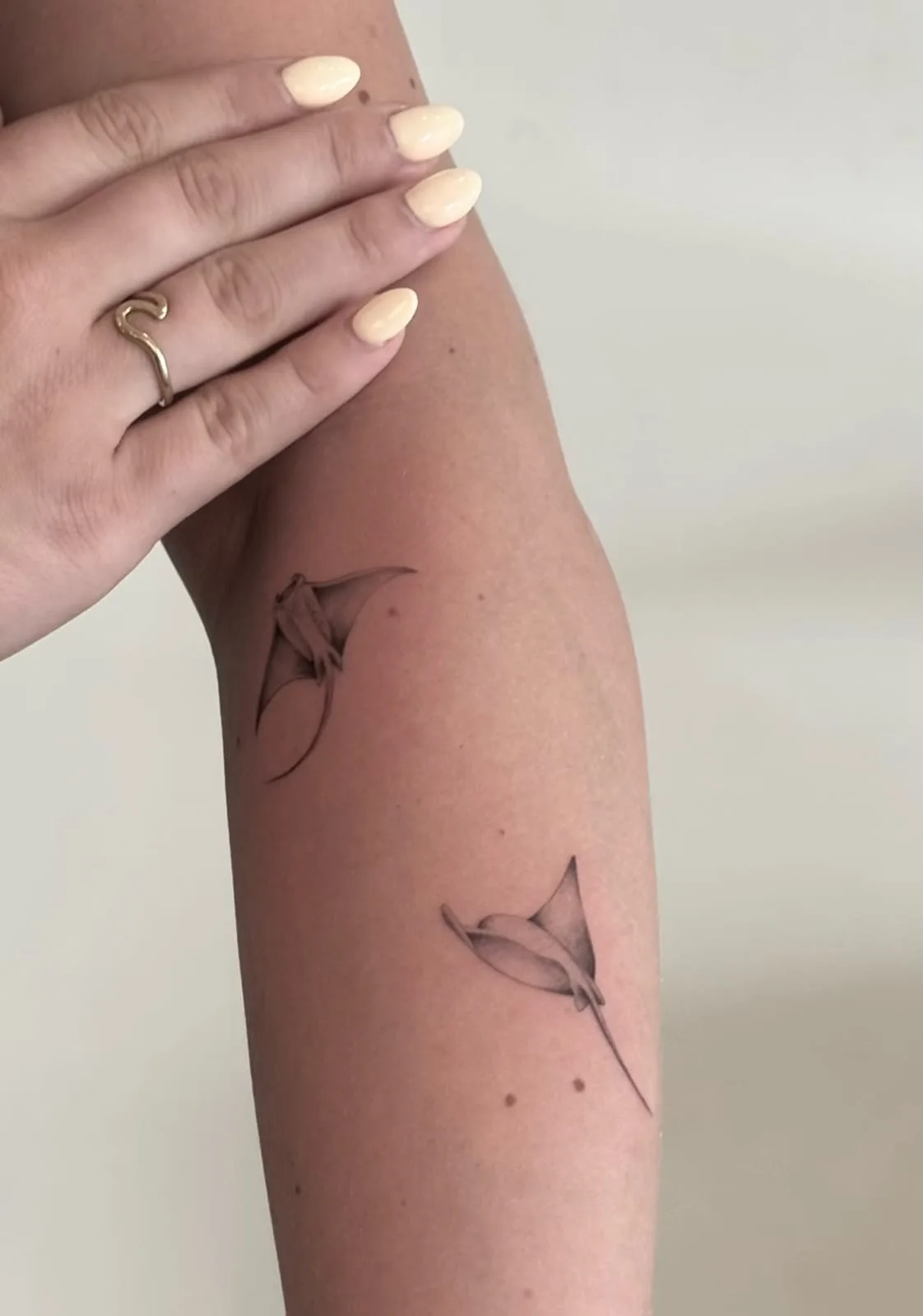 Fine line Balinese tattoo on the arm