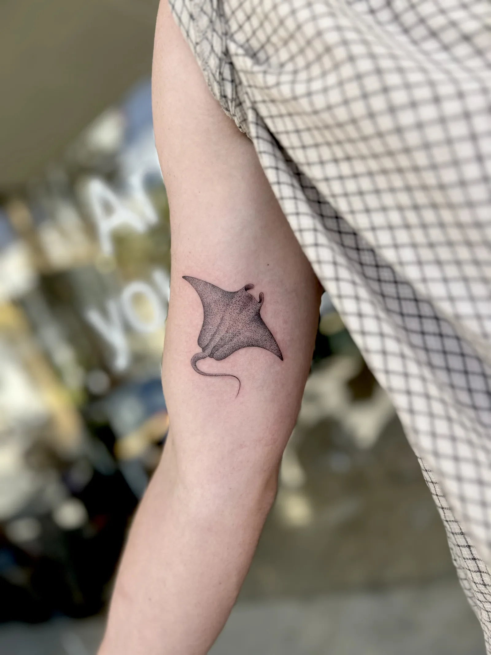 Fine line Balinese tattoo on the arm