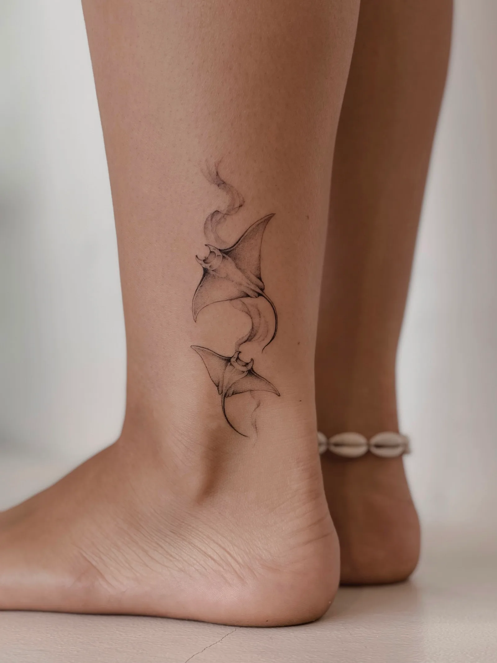 Fine line Balinese tattoo on the arm