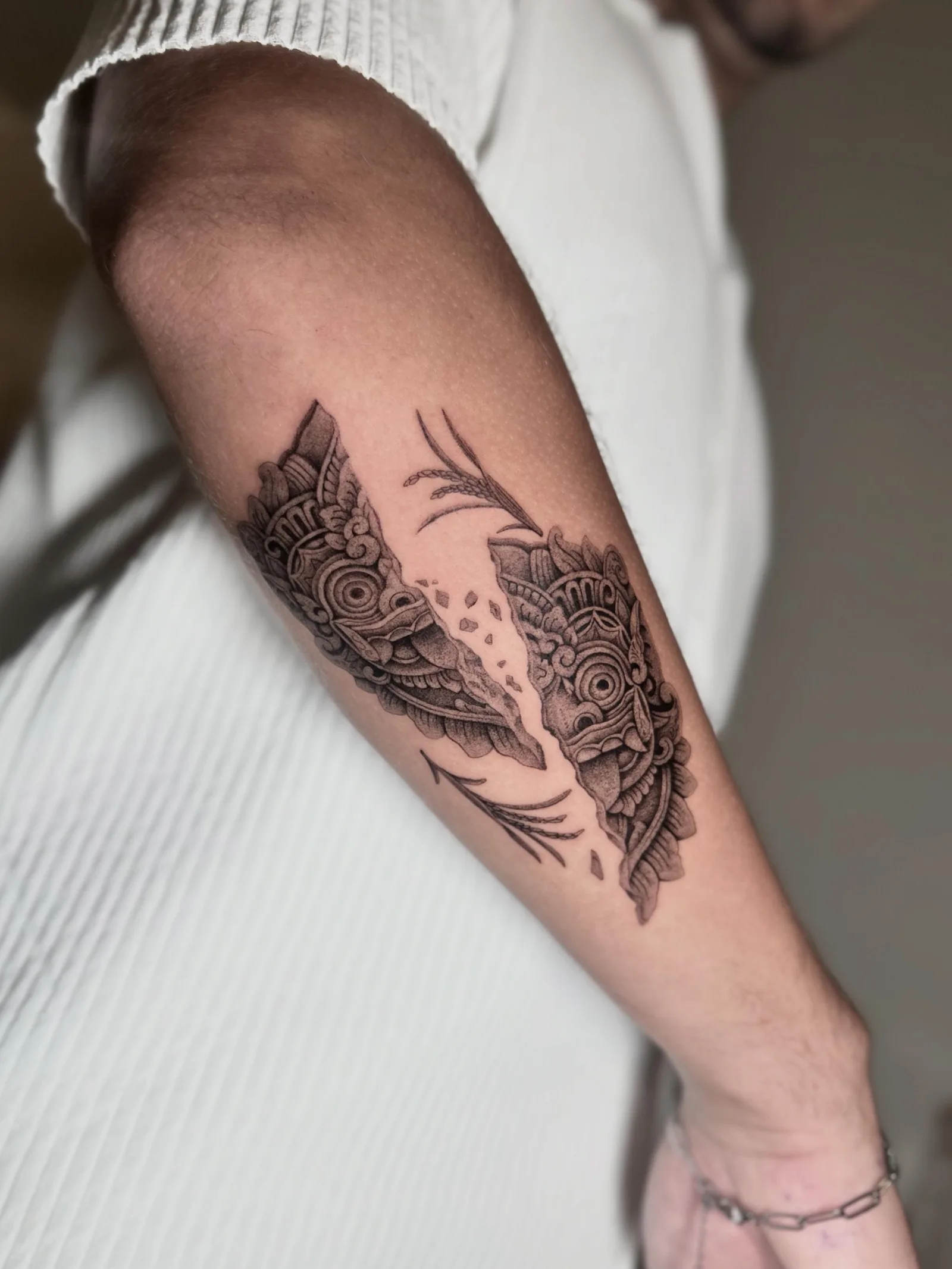 Realism Balinese tattoo on the arm