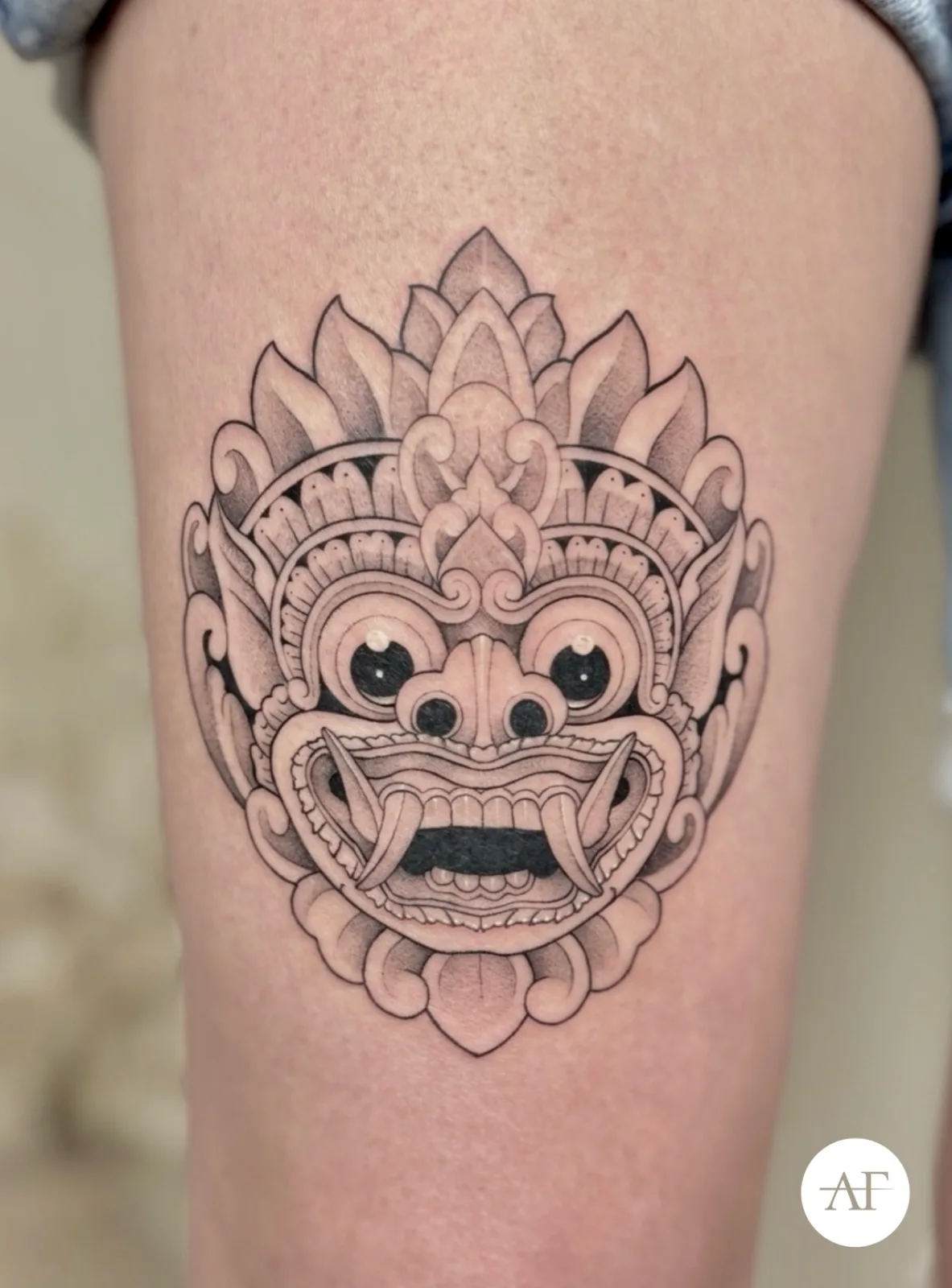 Blackwork & geometric Balinese tattoo on the arm