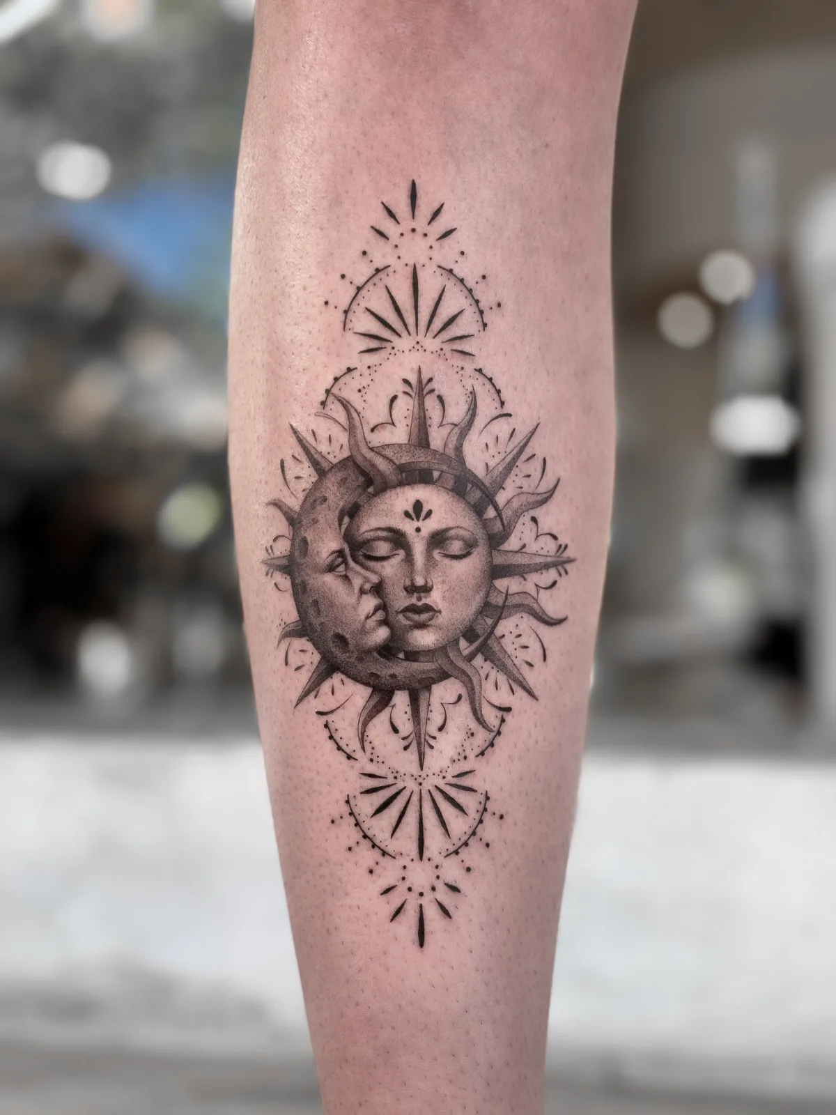 Blackwork & geometric Balinese tattoo on the arm