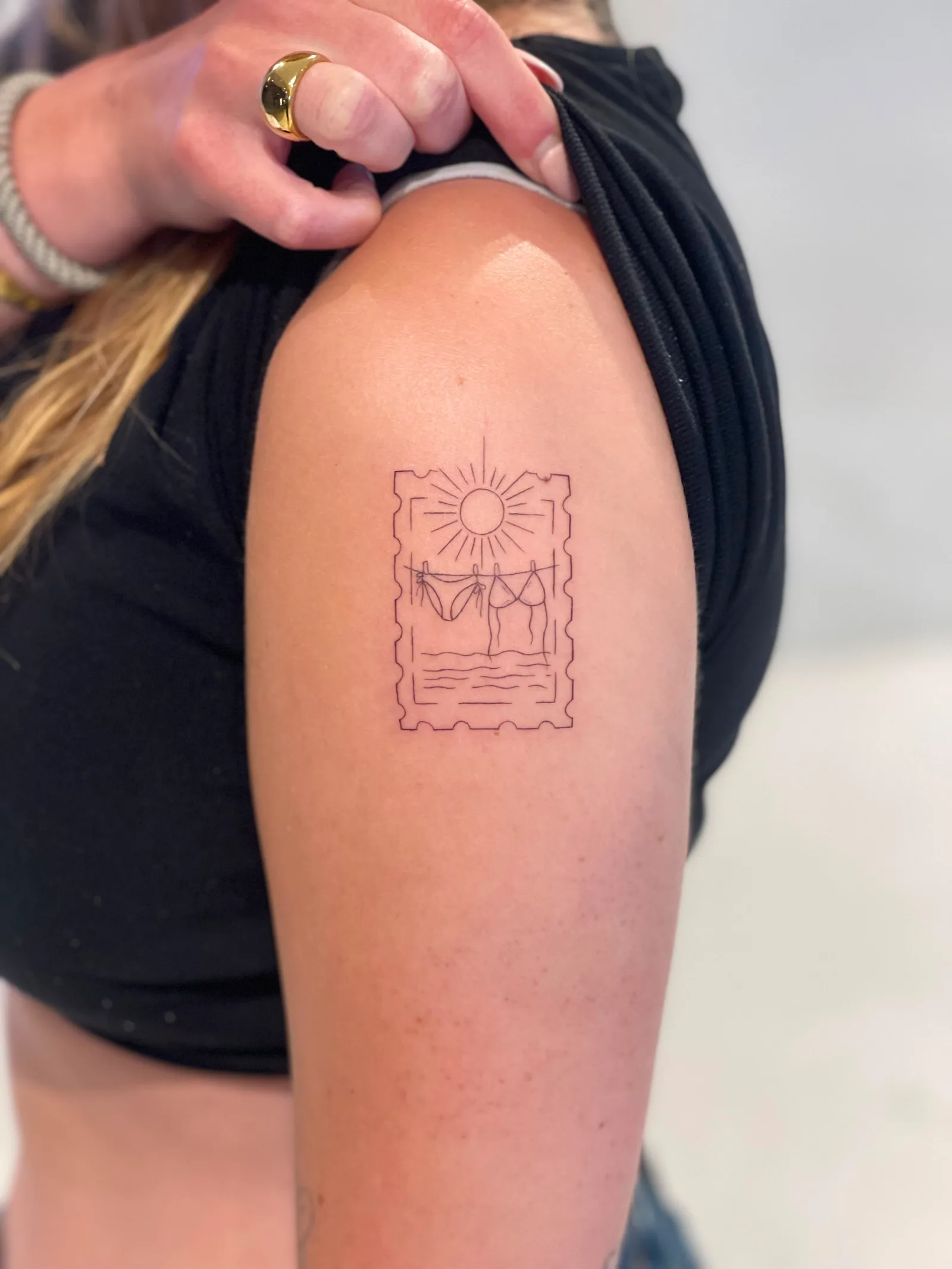Blackwork & geometric Balinese tattoo on the arm