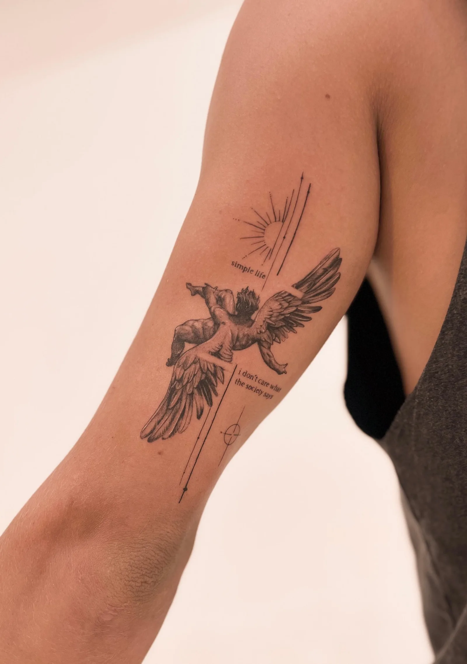 Fine line abstract tattoo on the arm