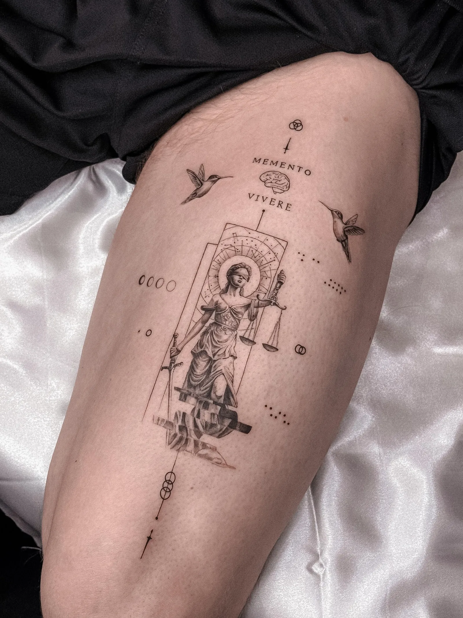 Fine line abstract tattoo on the arm