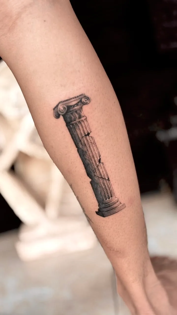 Fine line abstract tattoo on the arm