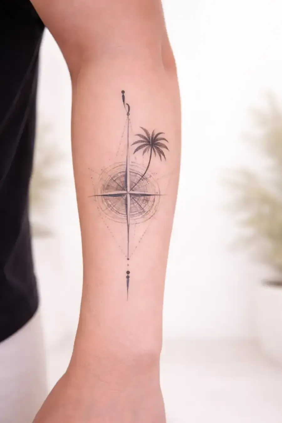 Fine line abstract tattoo on the arm