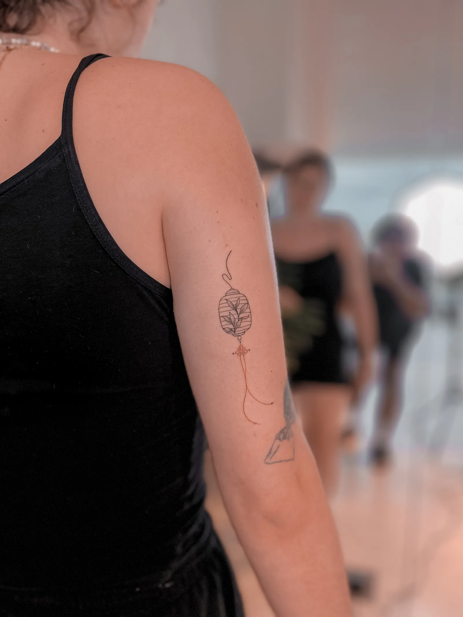 Fine line tattoo on the arm