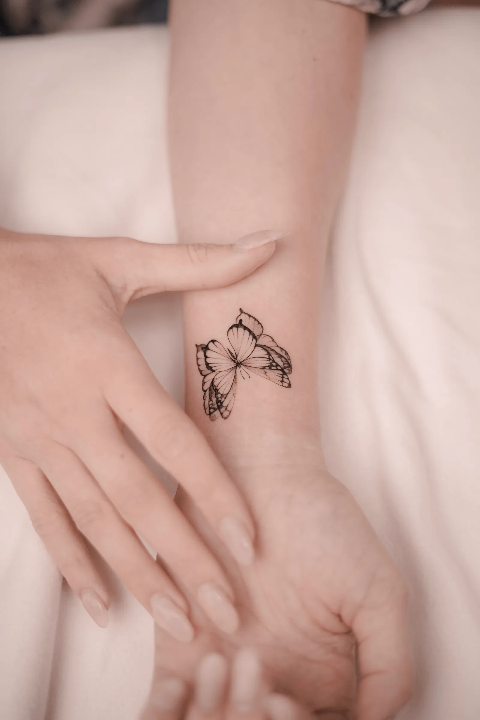 Fine line tattoo on the arm