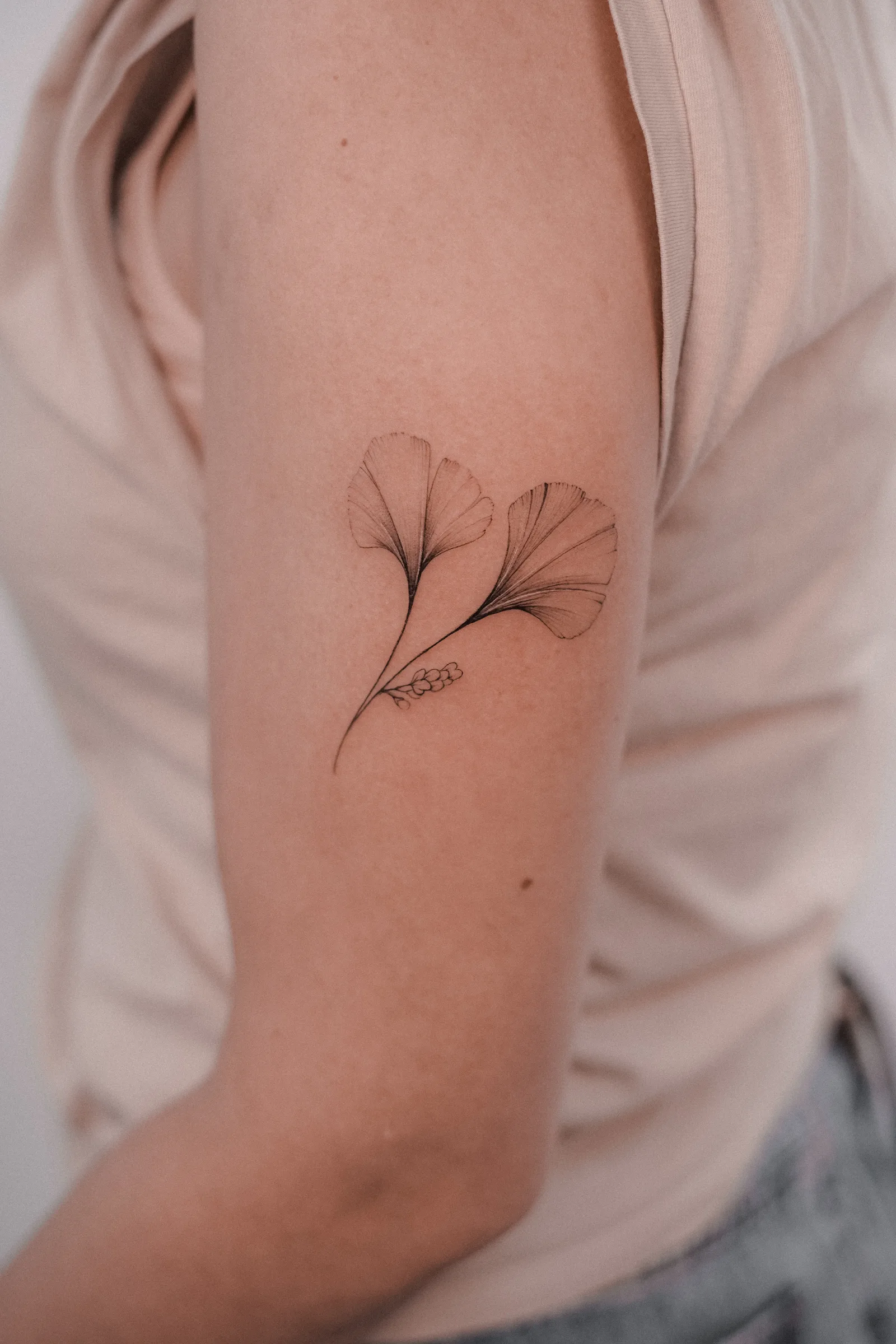 Fine line tattoo on the arm