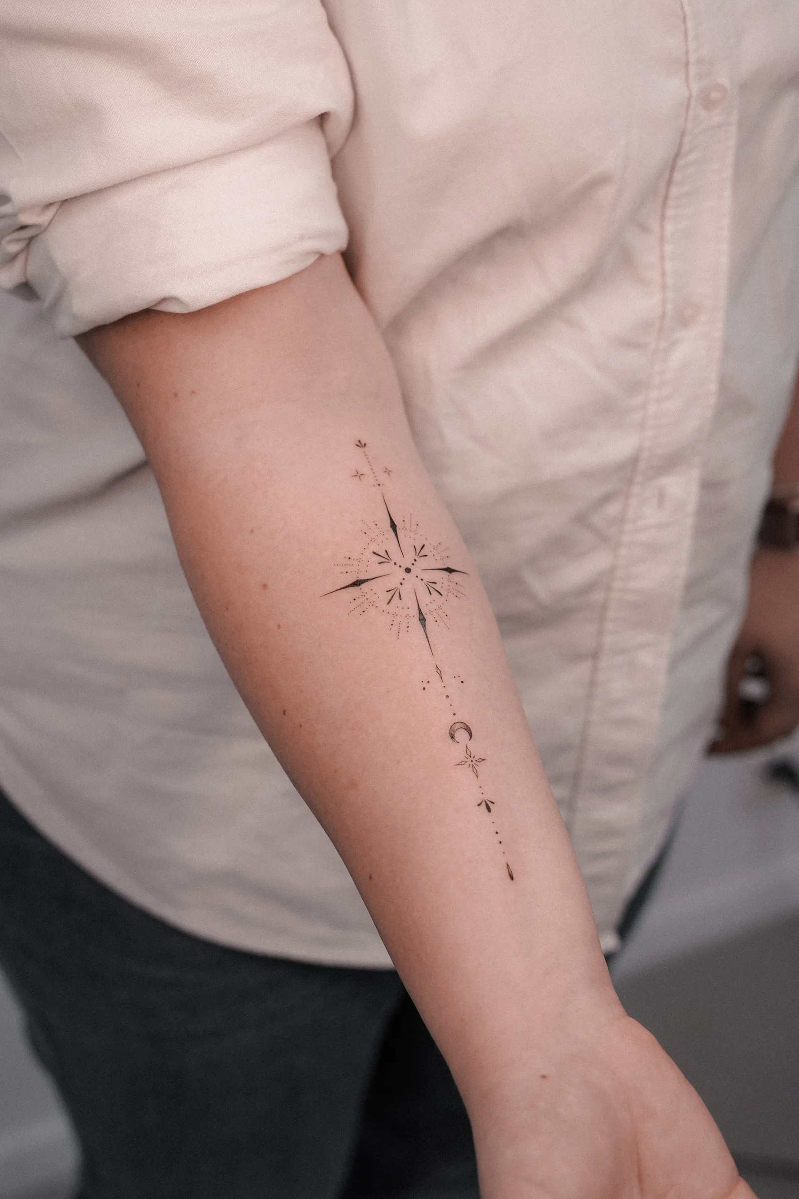 Fine line tattoo on the arm