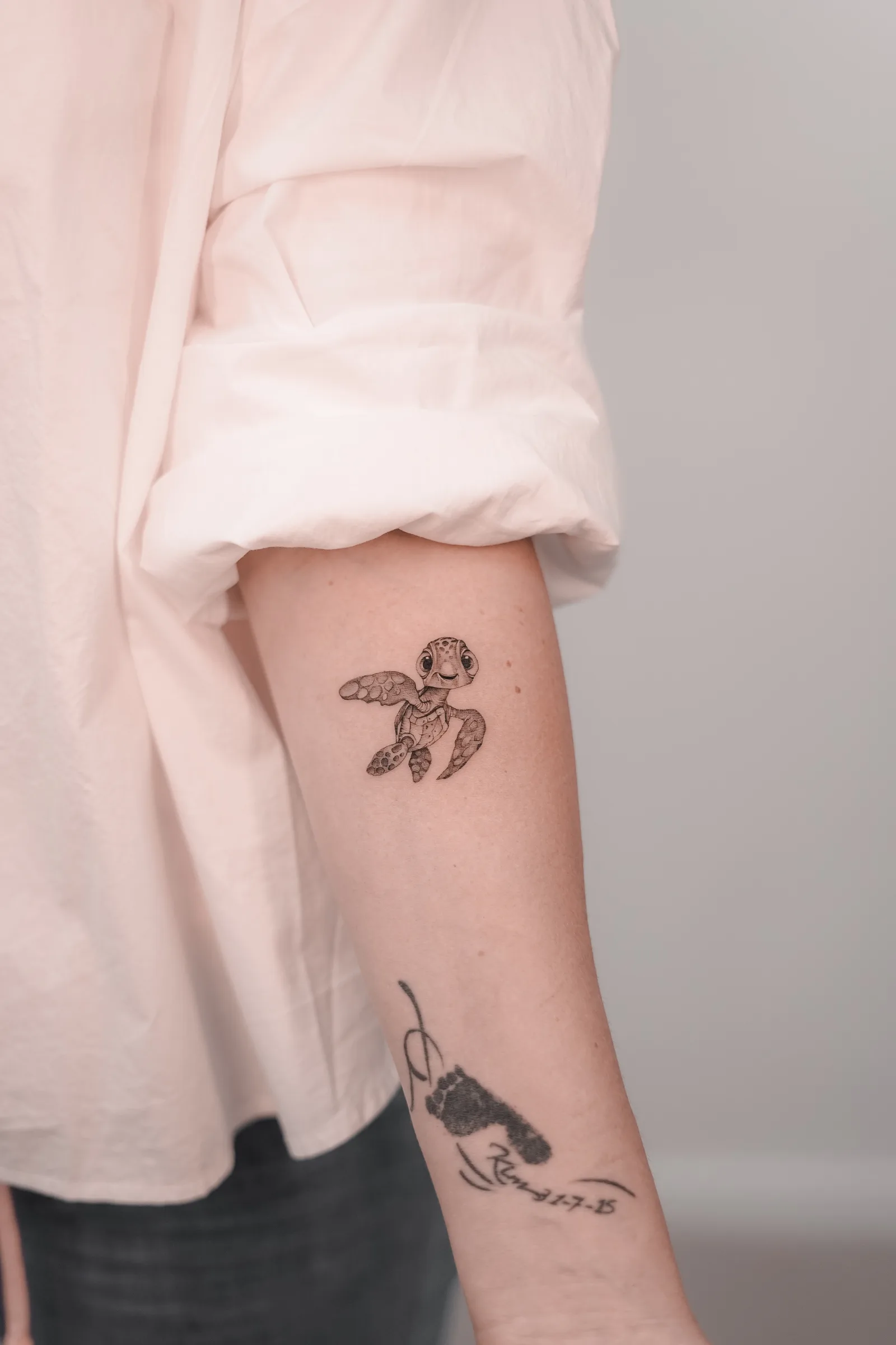 Fine line tattoo on the arm