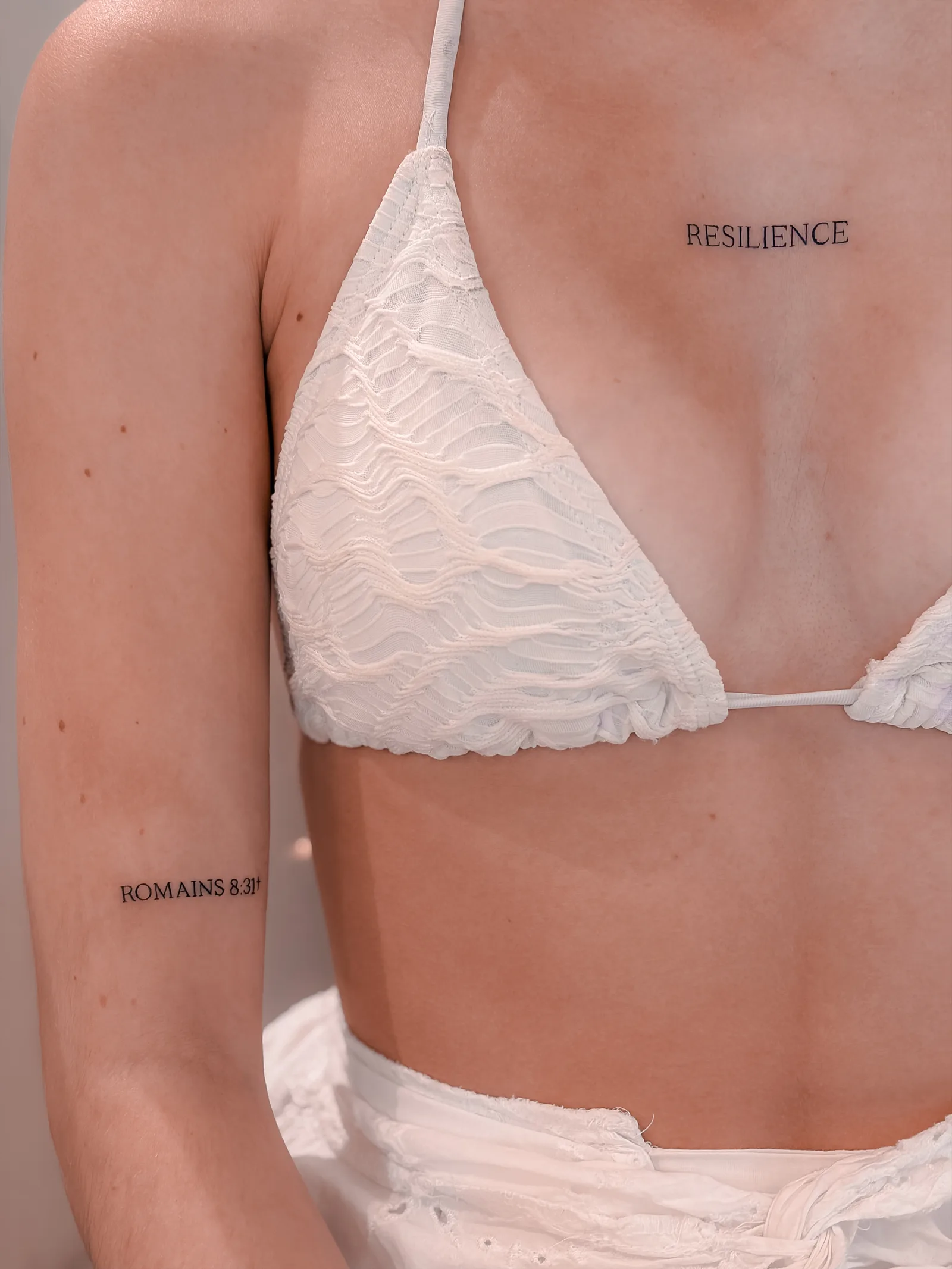Fine line tattoo on the arm