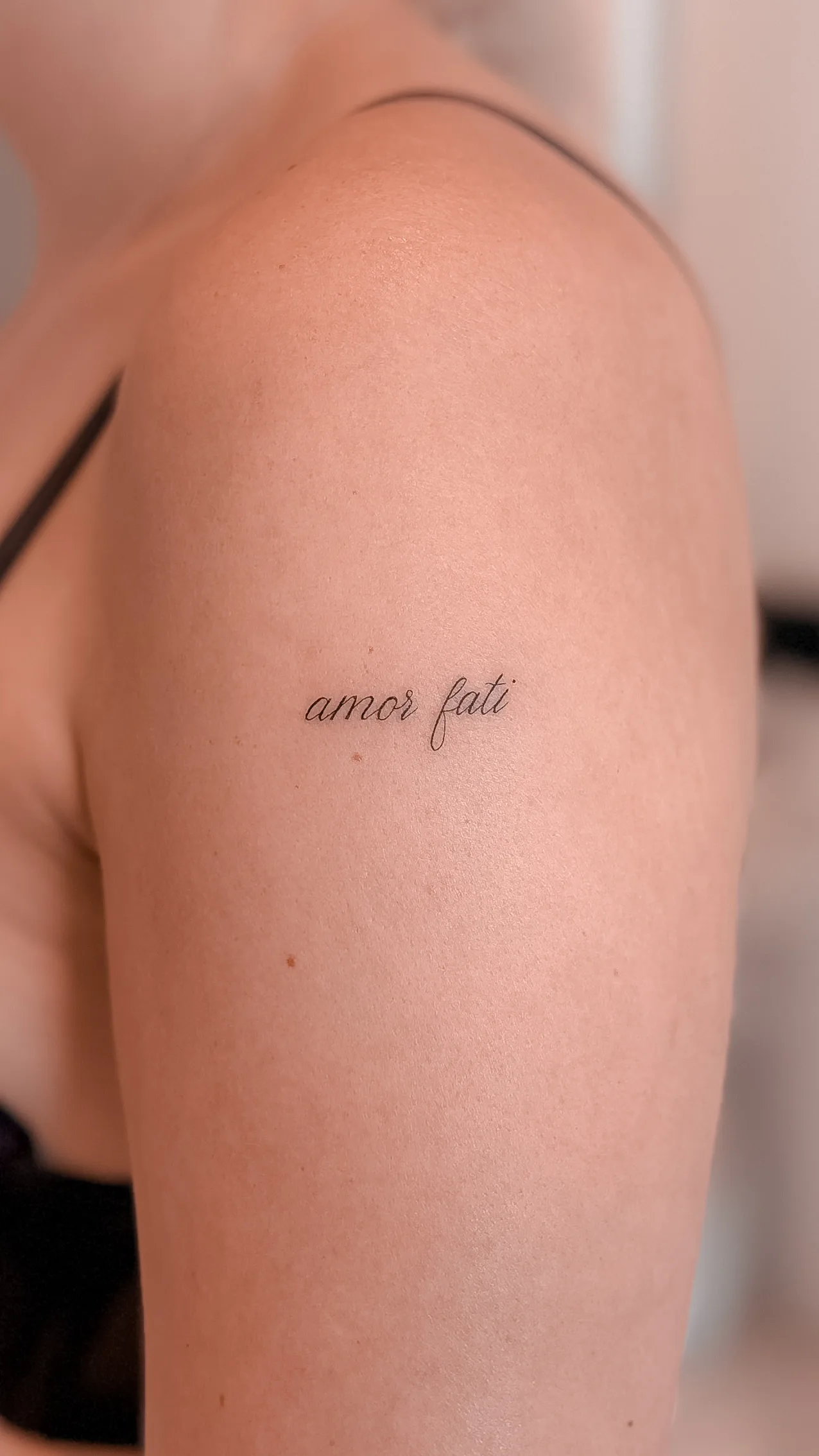Fine line tattoo on the arm