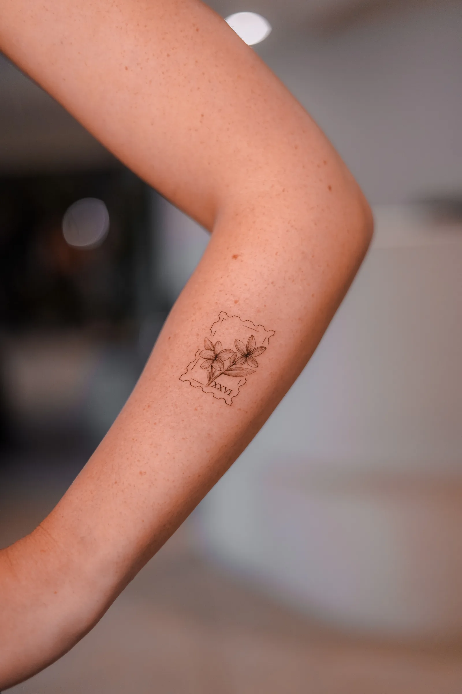 Fine line tattoo on the arm