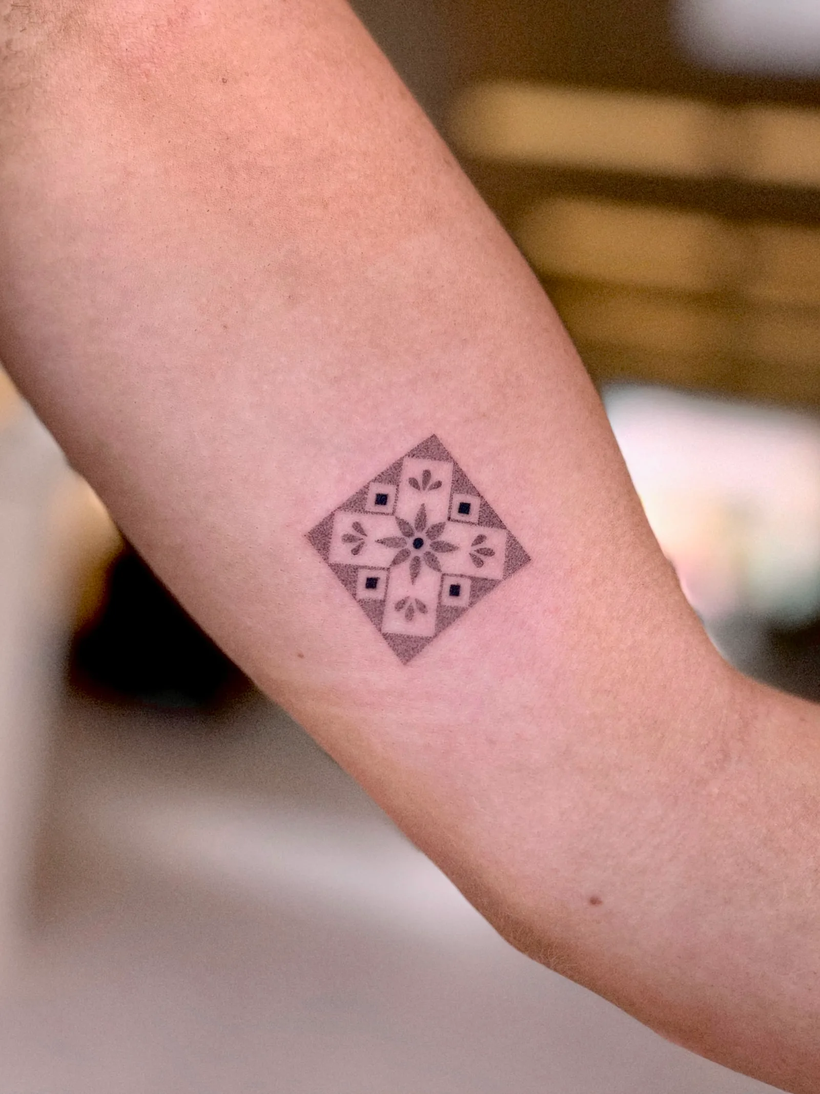 Fine line tattoo on the arm