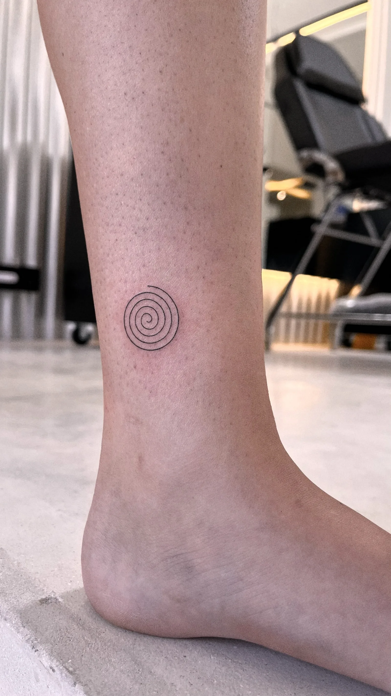 Fine line tattoo on the arm