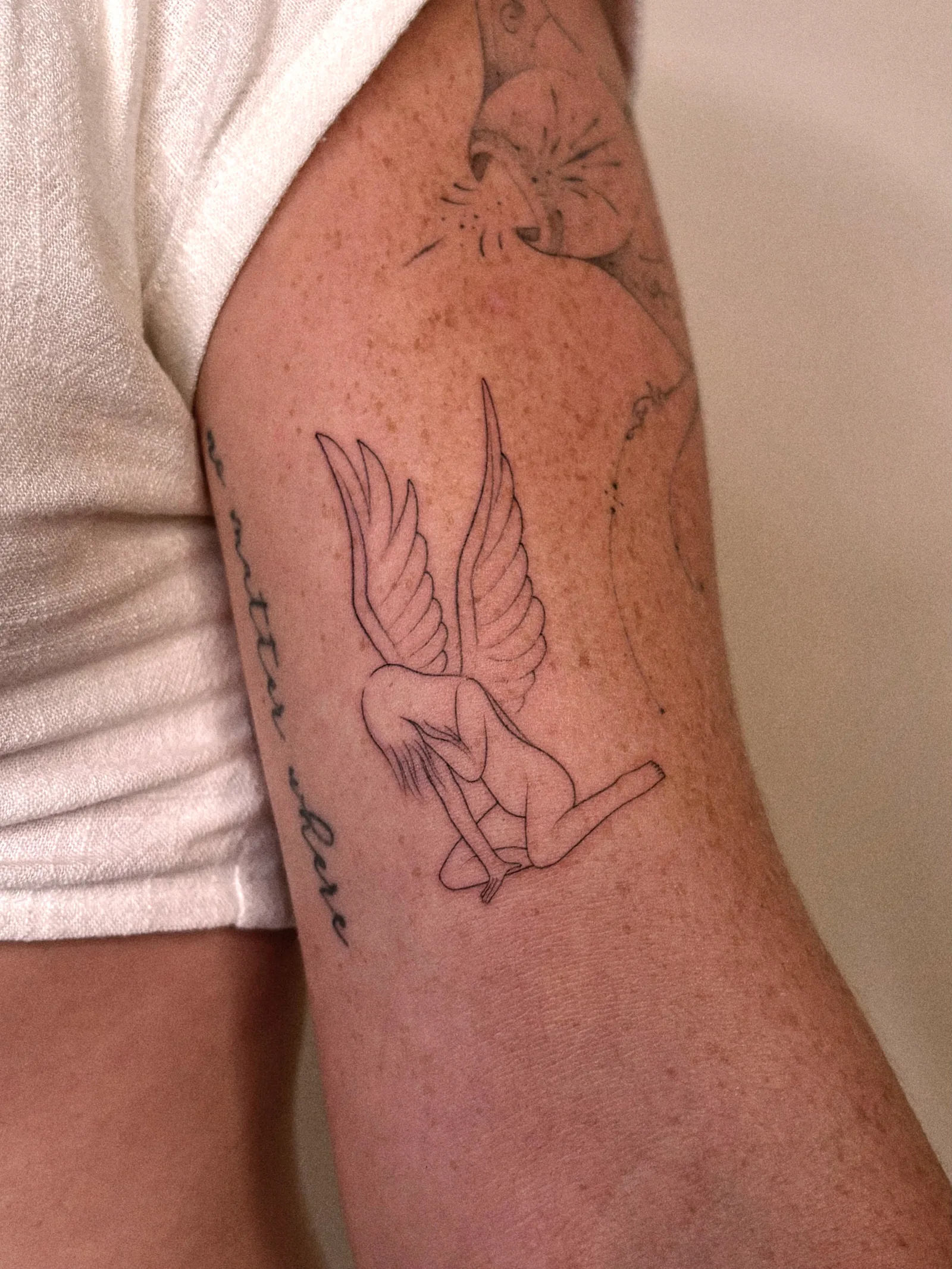 Fine line tattoo on the arm