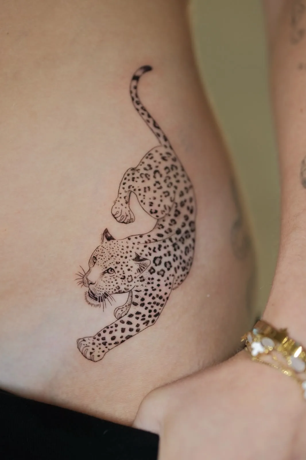 Fine line tattoo on the arm