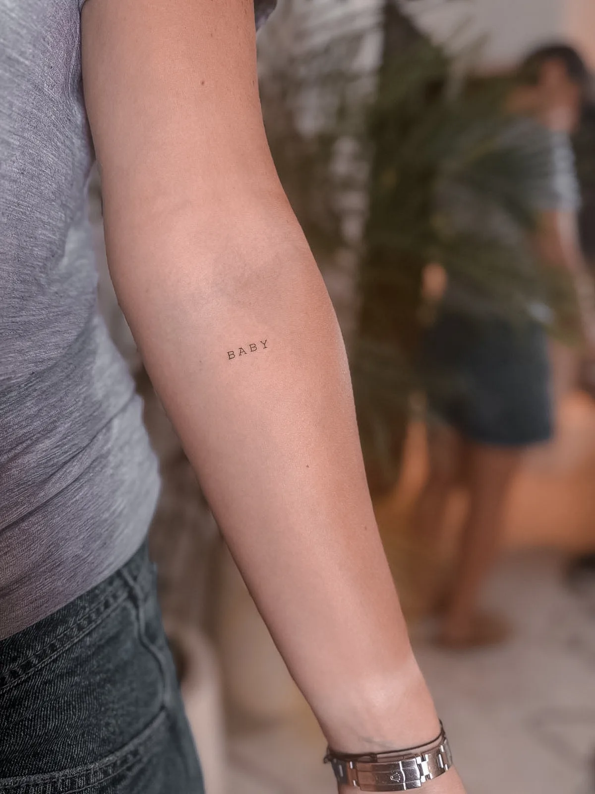 Fine line tattoo on the arm