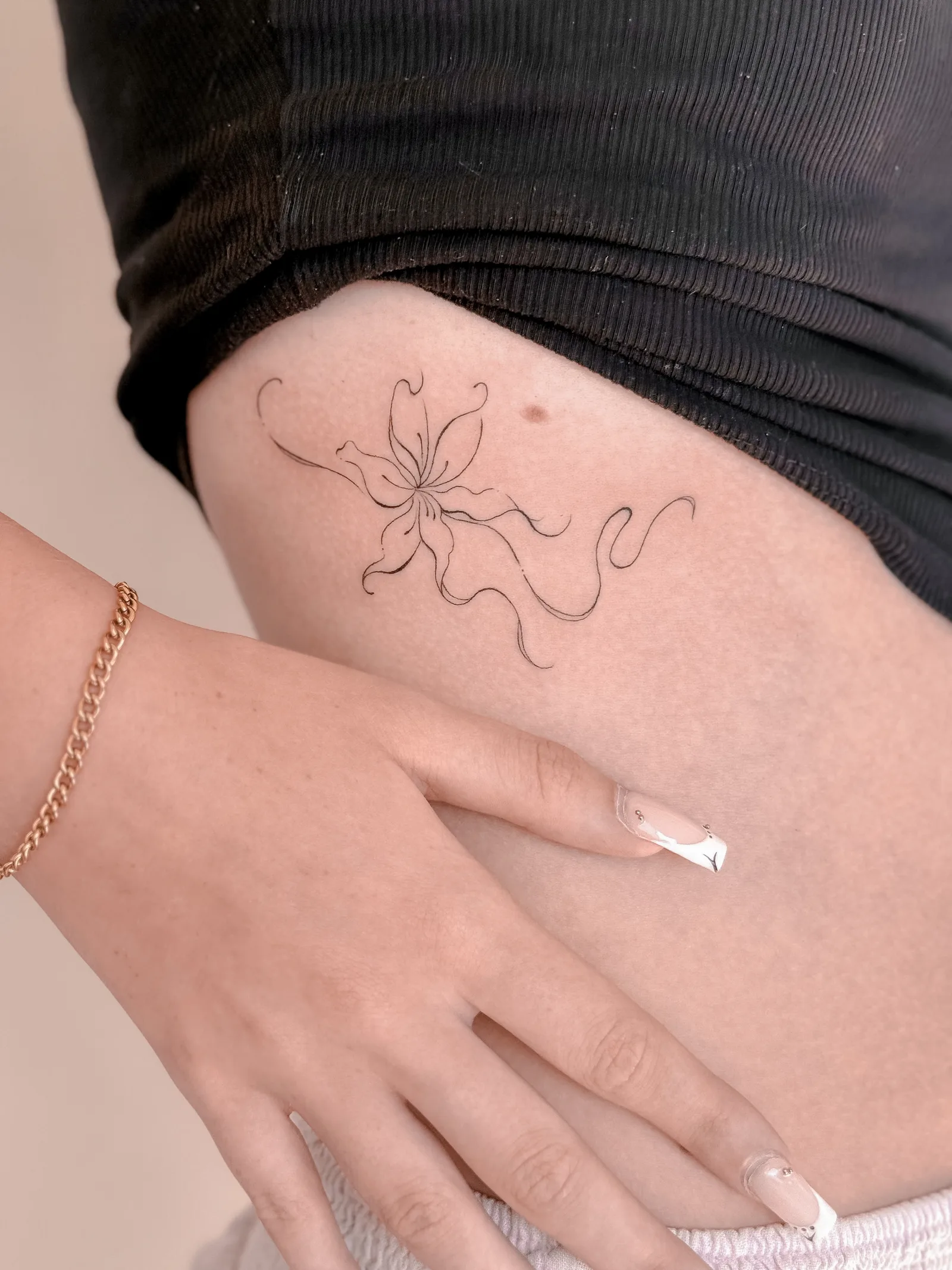 Fine line tattoo on the arm