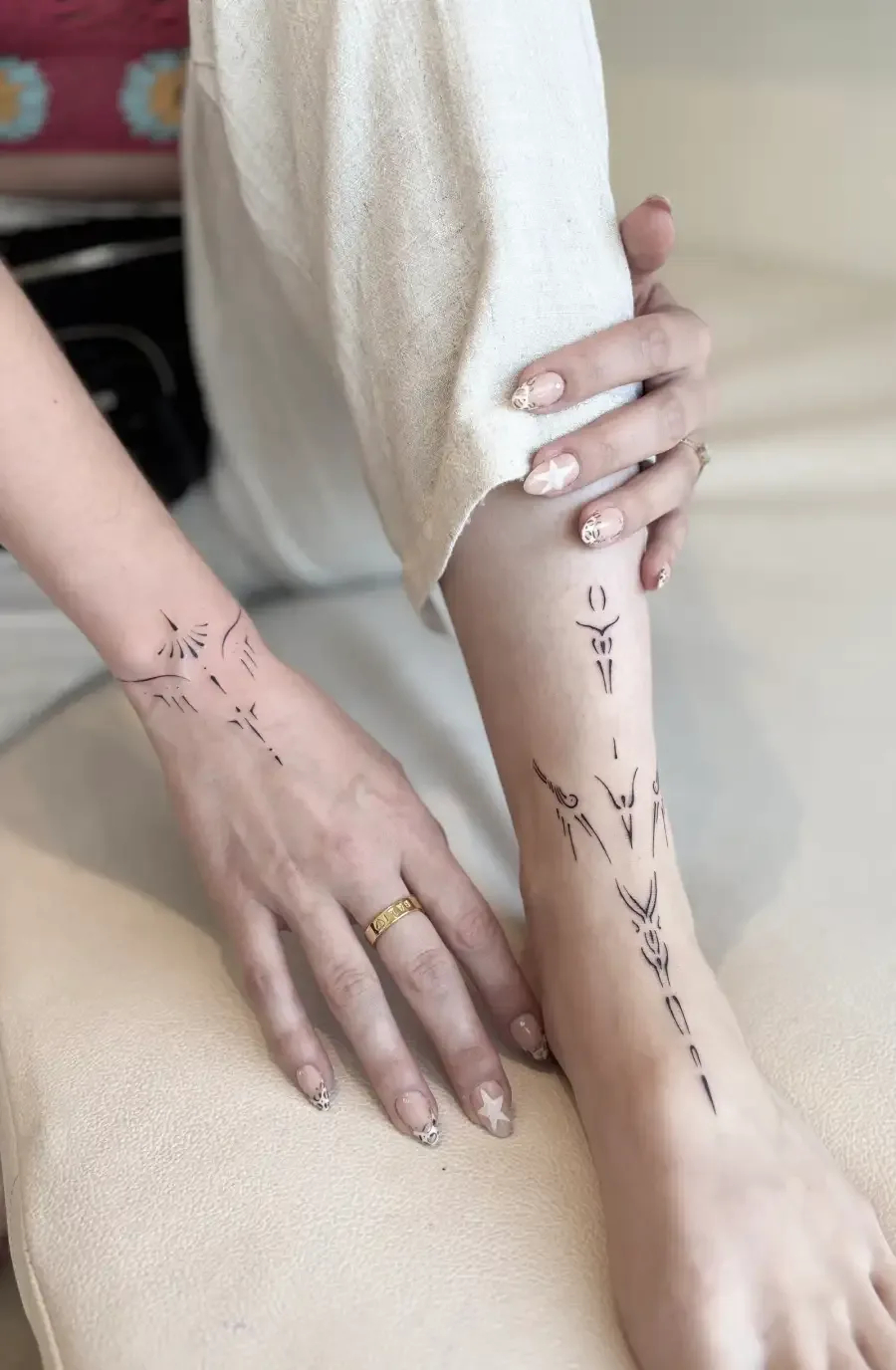 Fine line tattoo on the ankle or foot