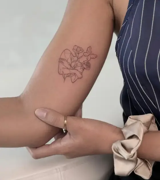 Fine line tattoo on the arm