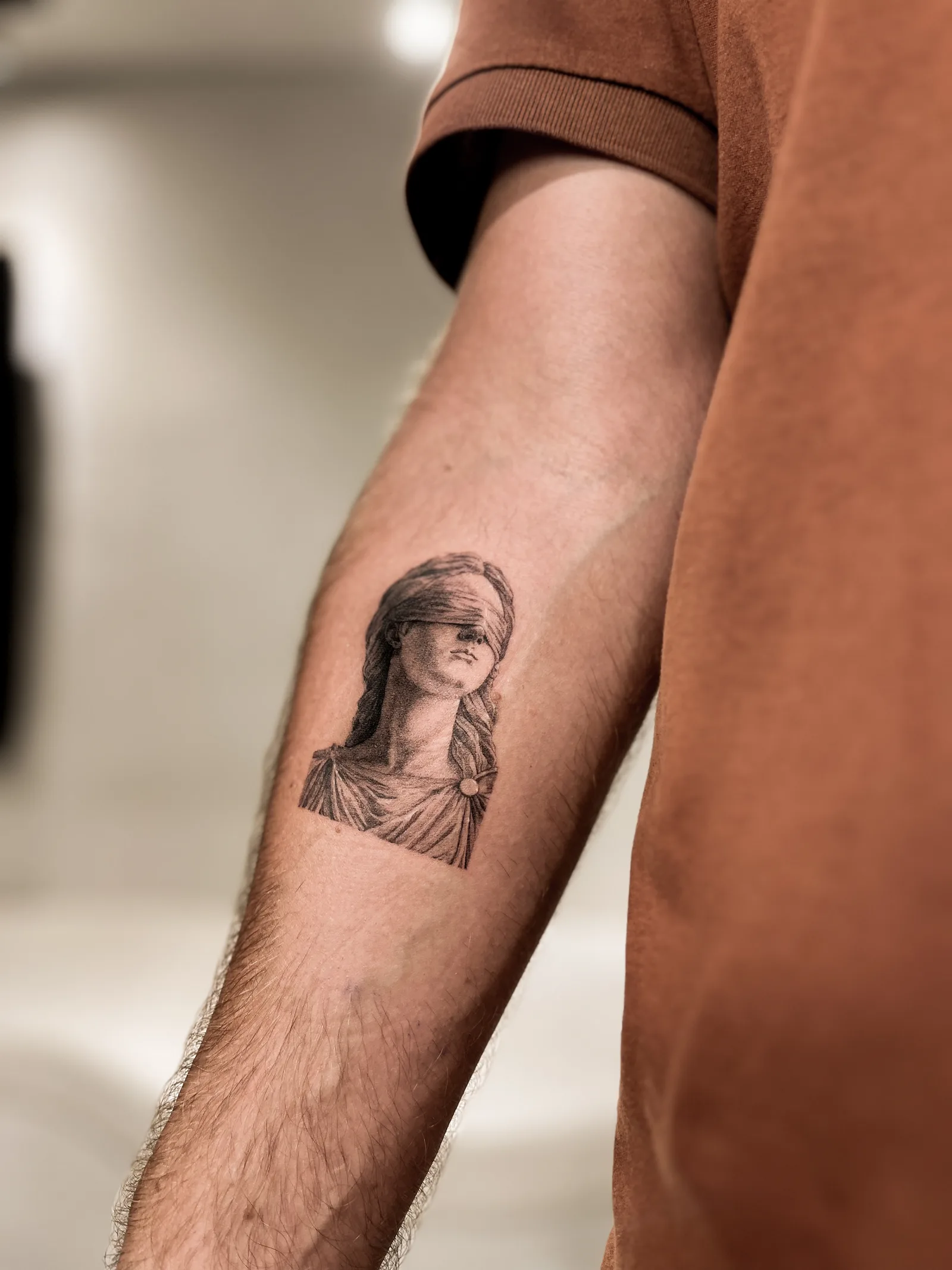 Micro-realism abstract tattoo on the arm