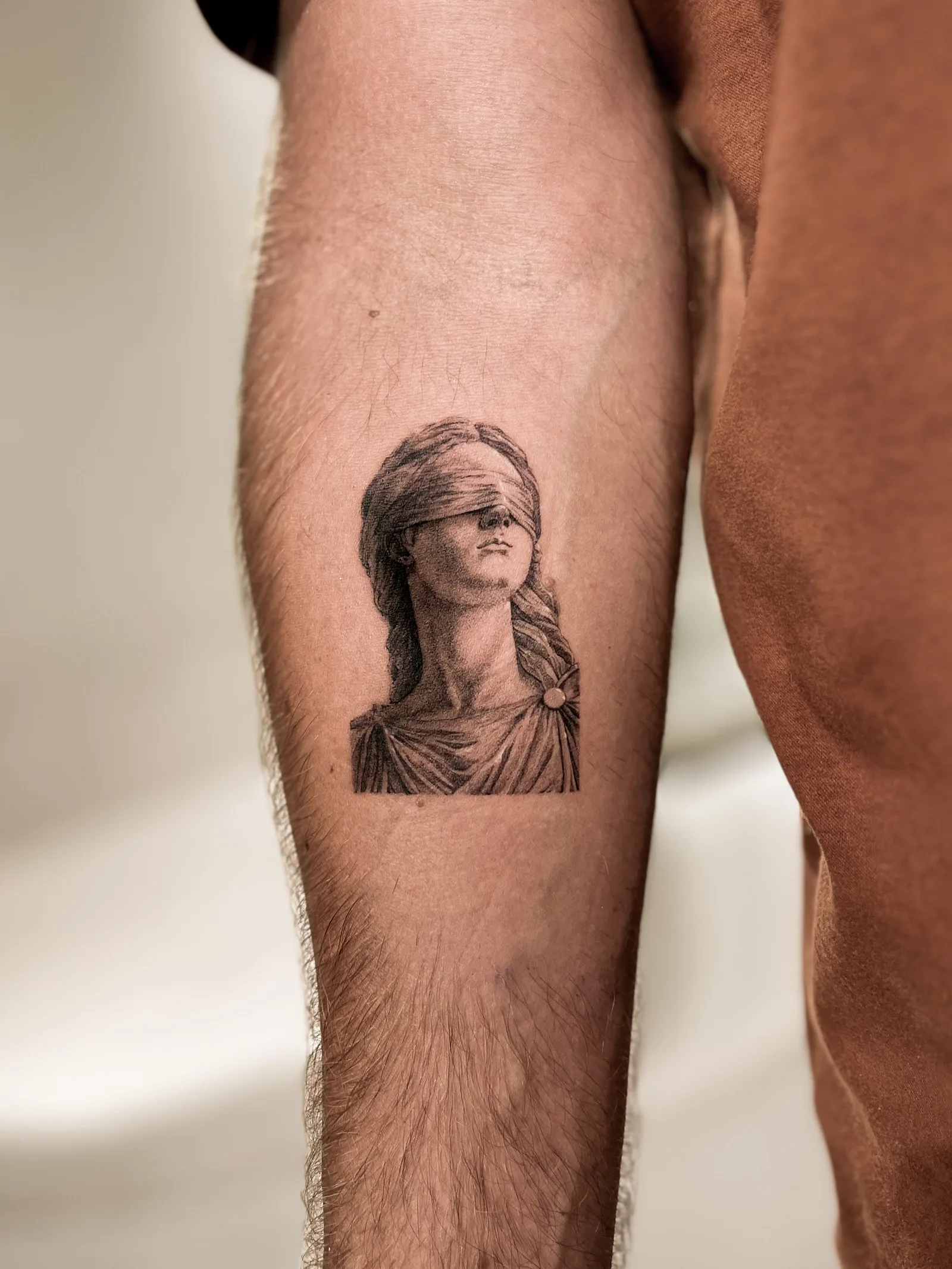 Micro-realism abstract tattoo on the arm