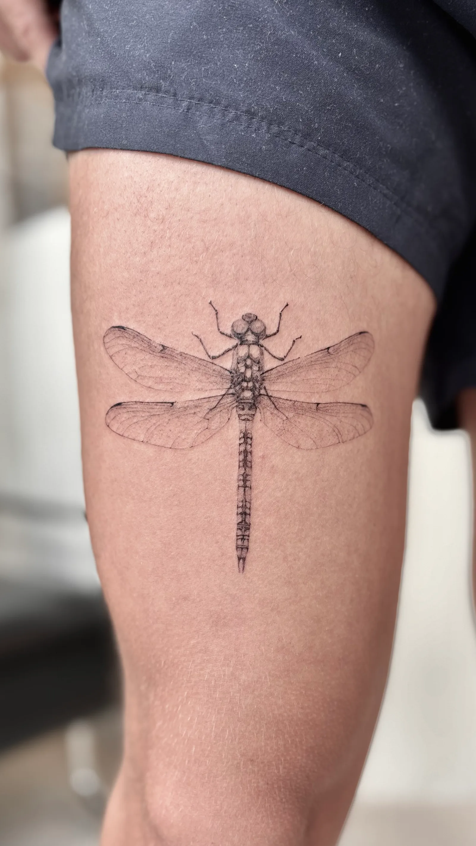 Micro-realism tattoo on the arm
