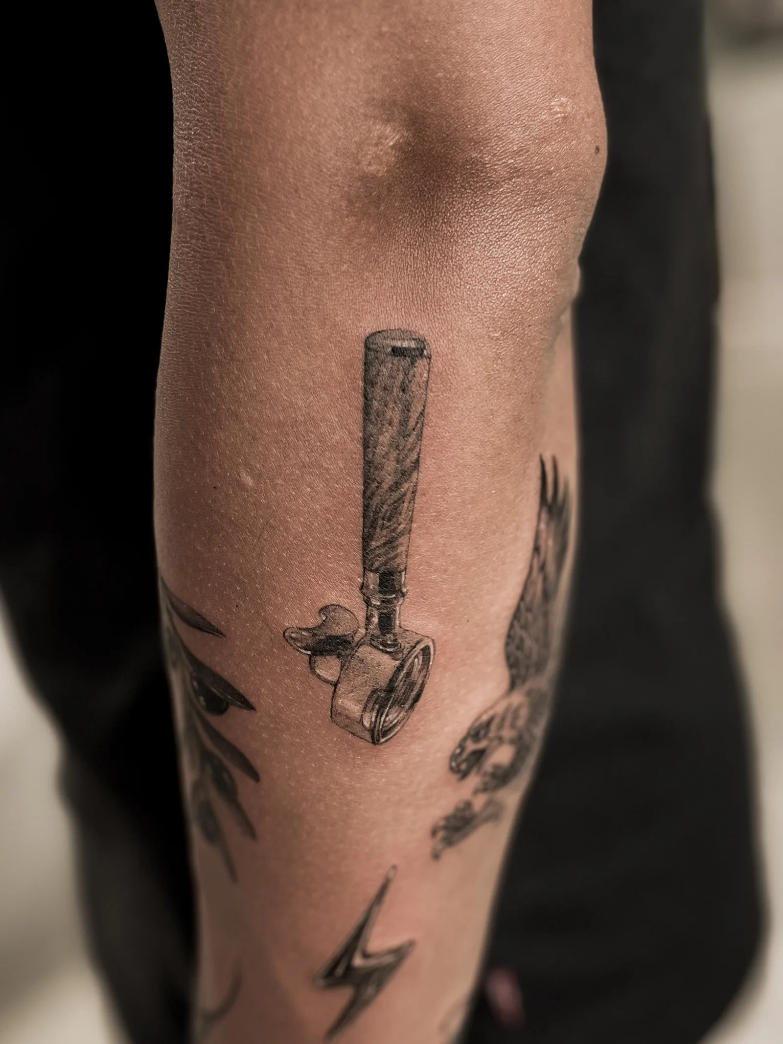 Micro-realism tattoo on the arm