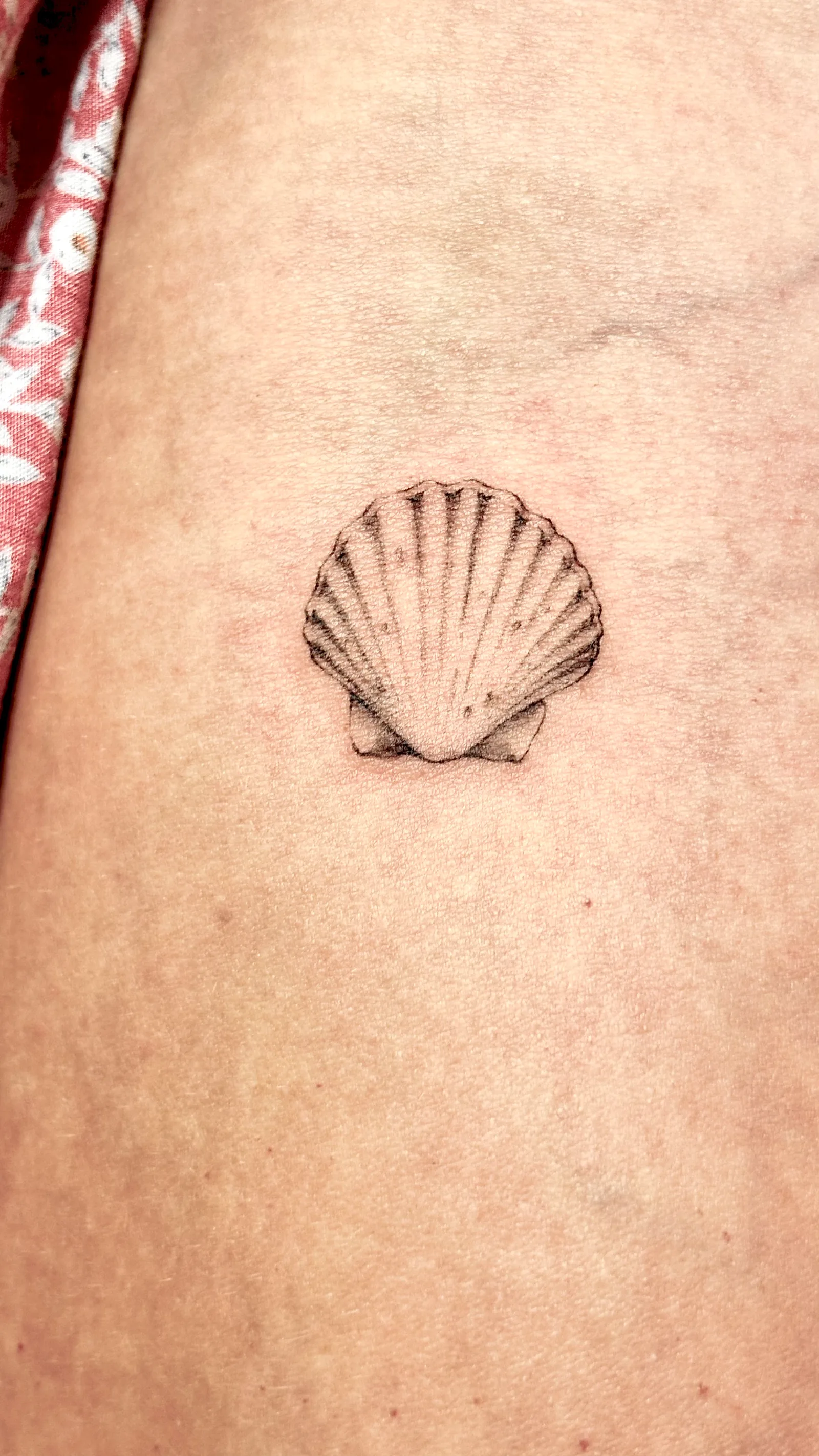 Micro-realism tattoo on the arm