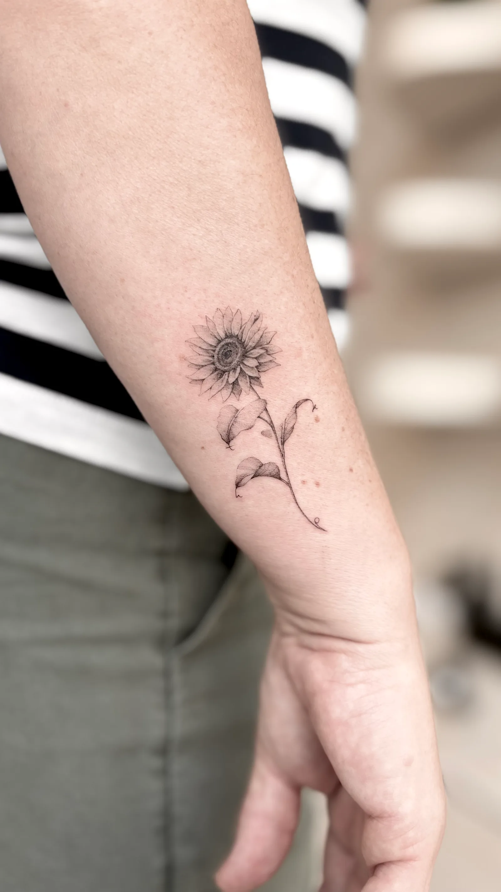 Micro-realism tattoo on the arm