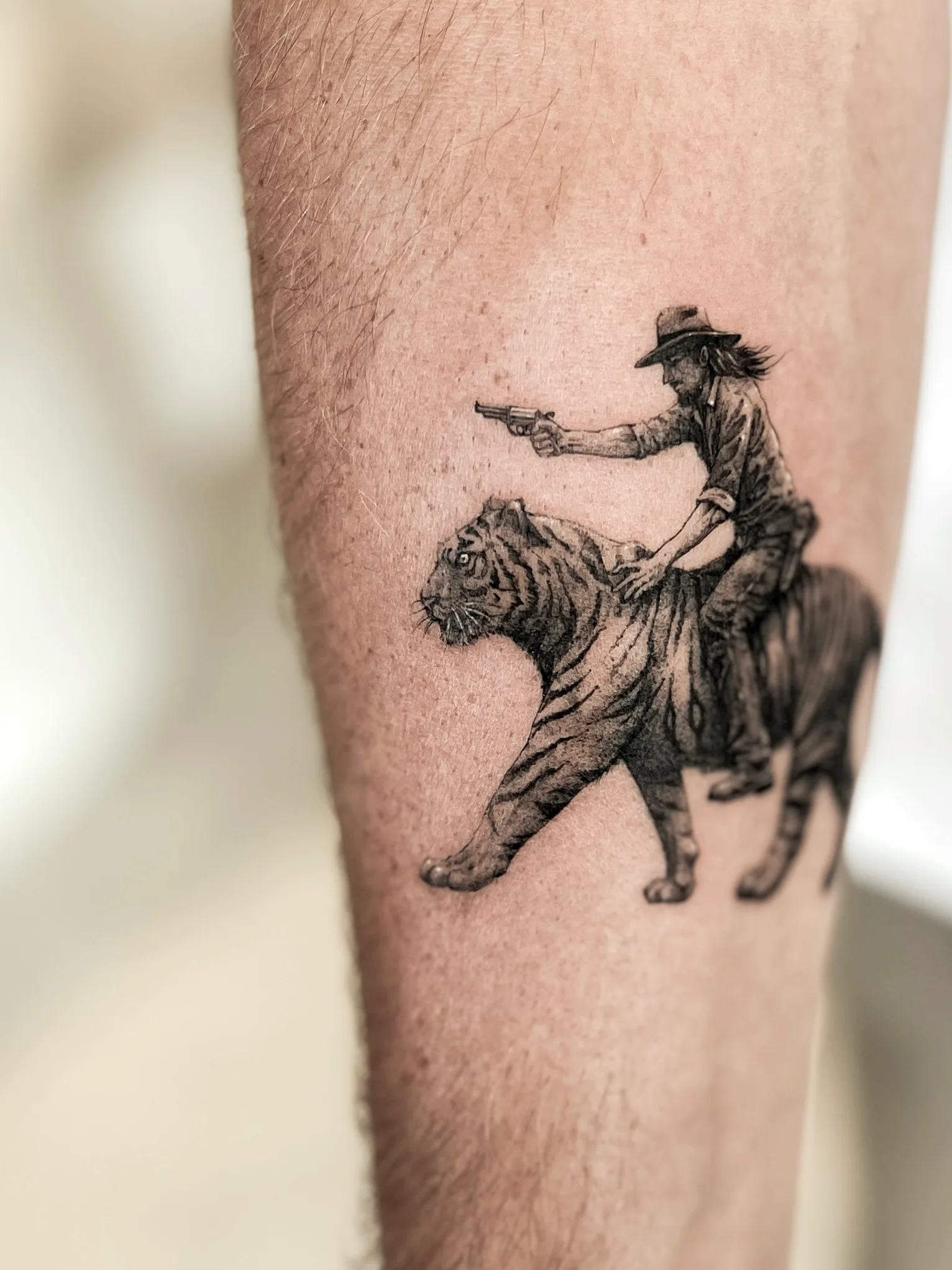 Micro-realism portrait tattoo on the arm