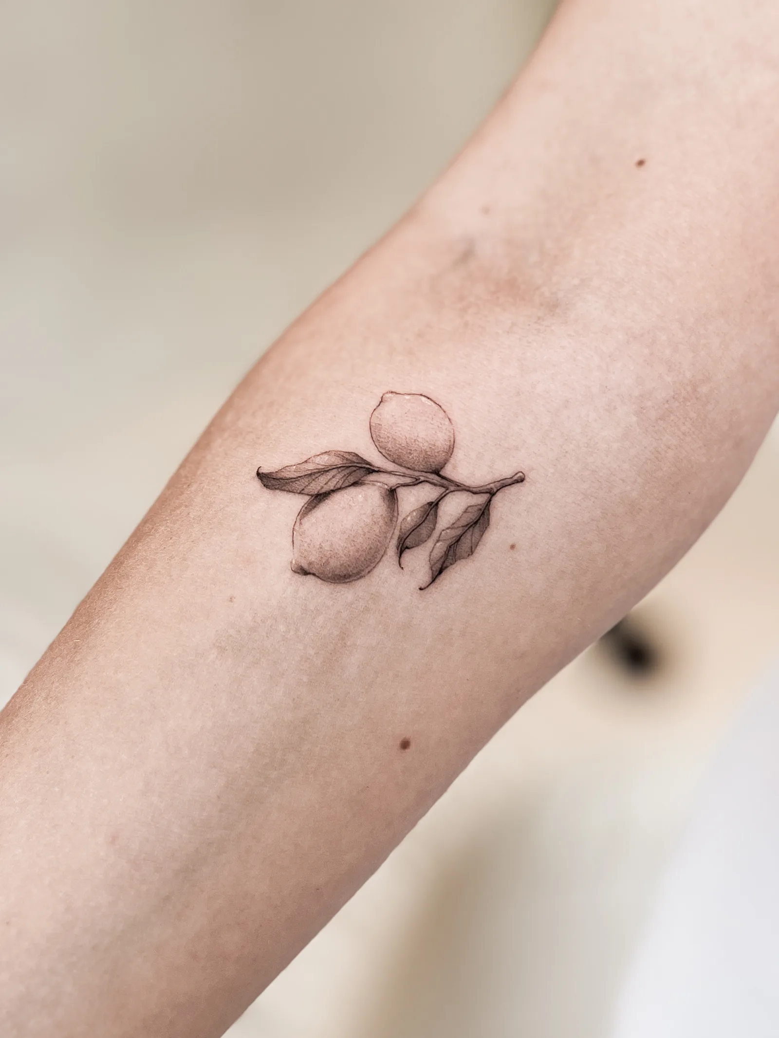 Micro-realism tattoo on the arm