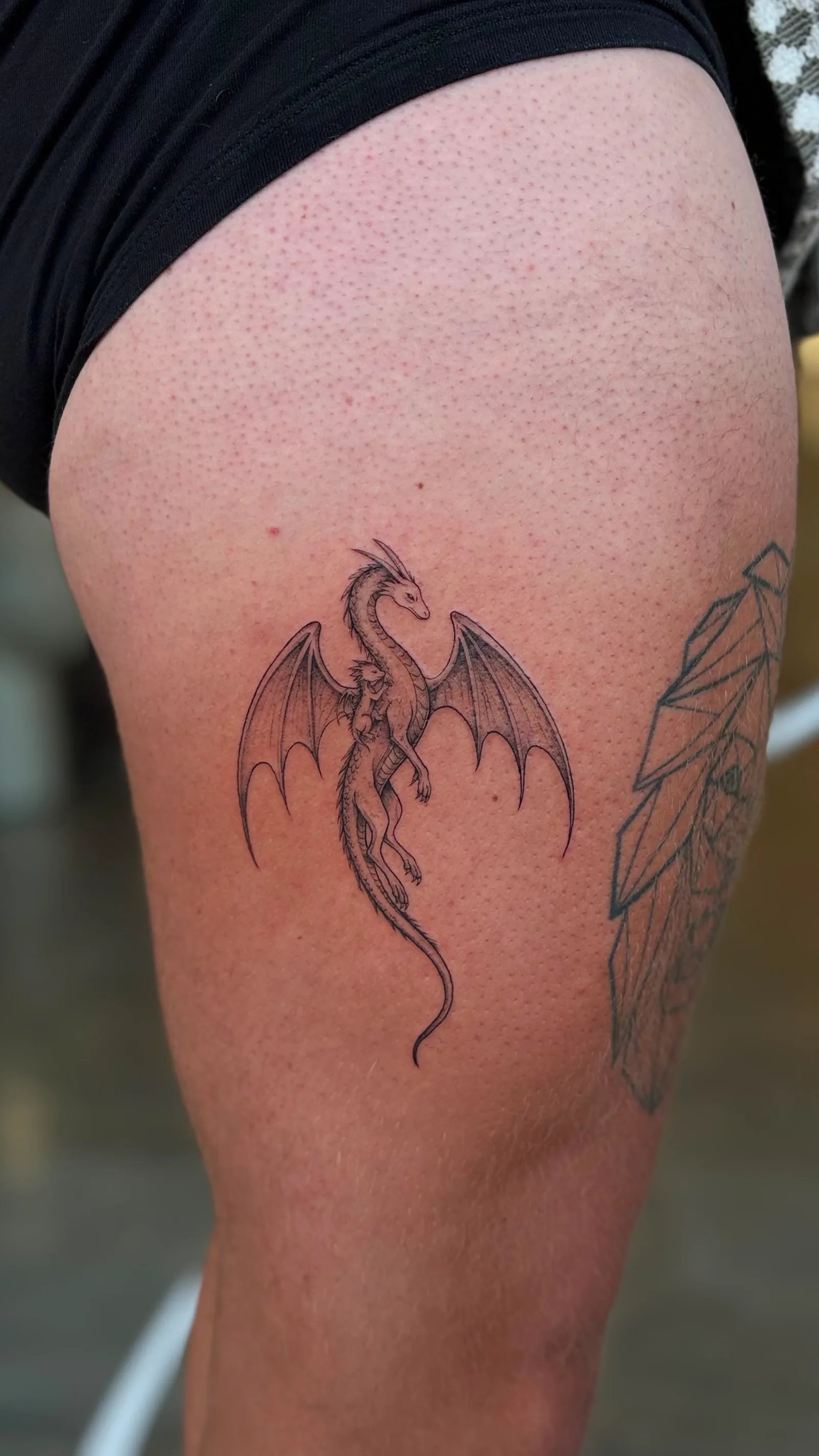Micro-realism portrait tattoo on the arm