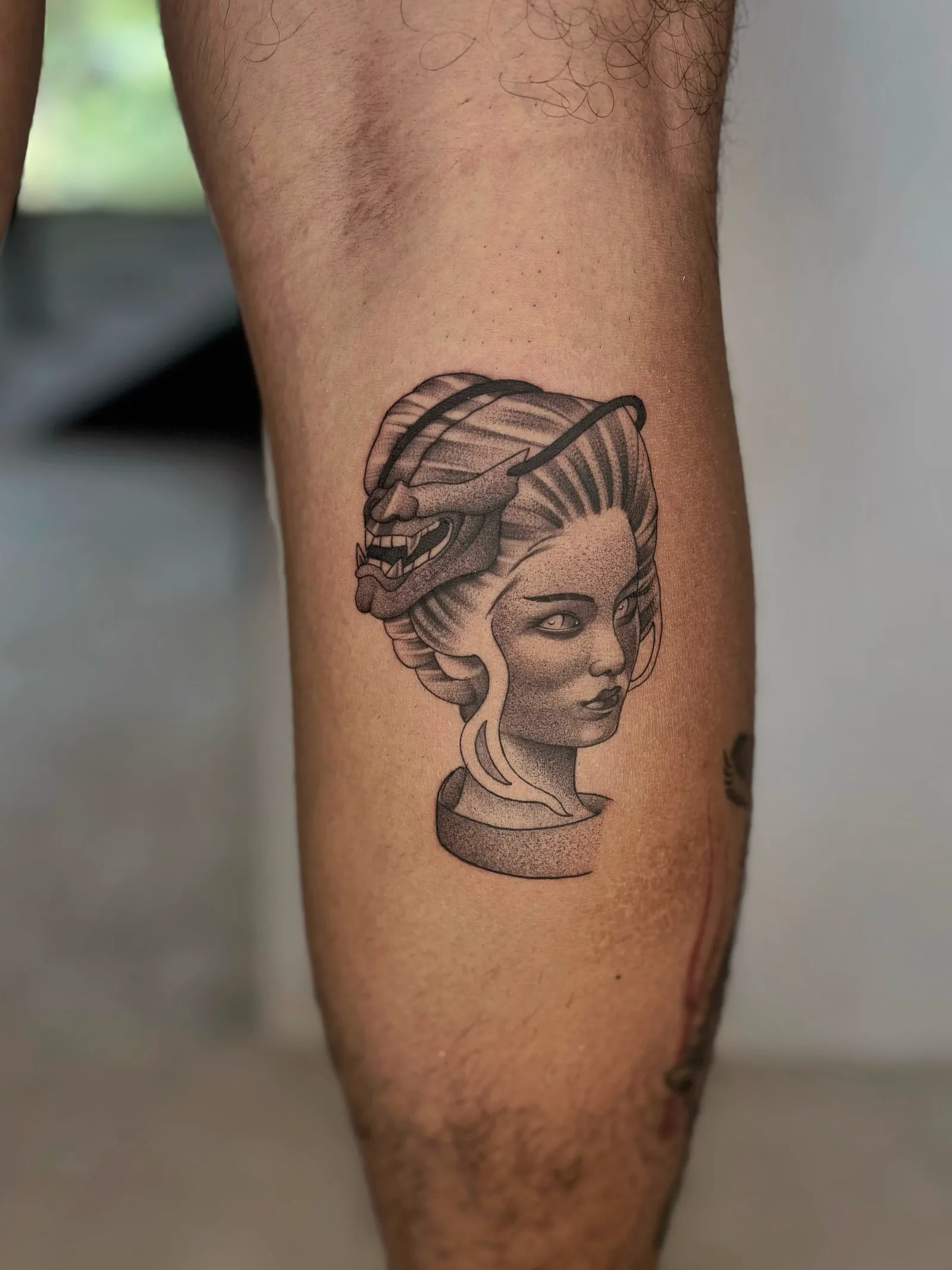 Micro-realism portrait tattoo on the arm