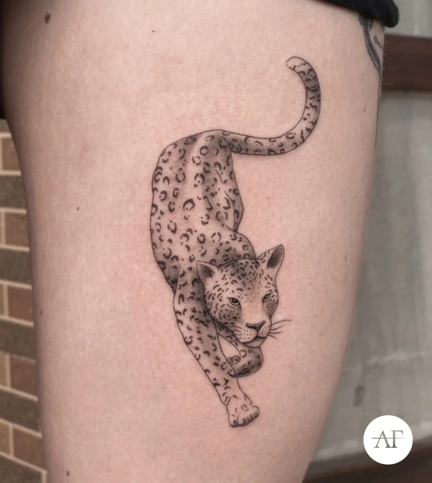 Micro-realism animal tattoo on the arm